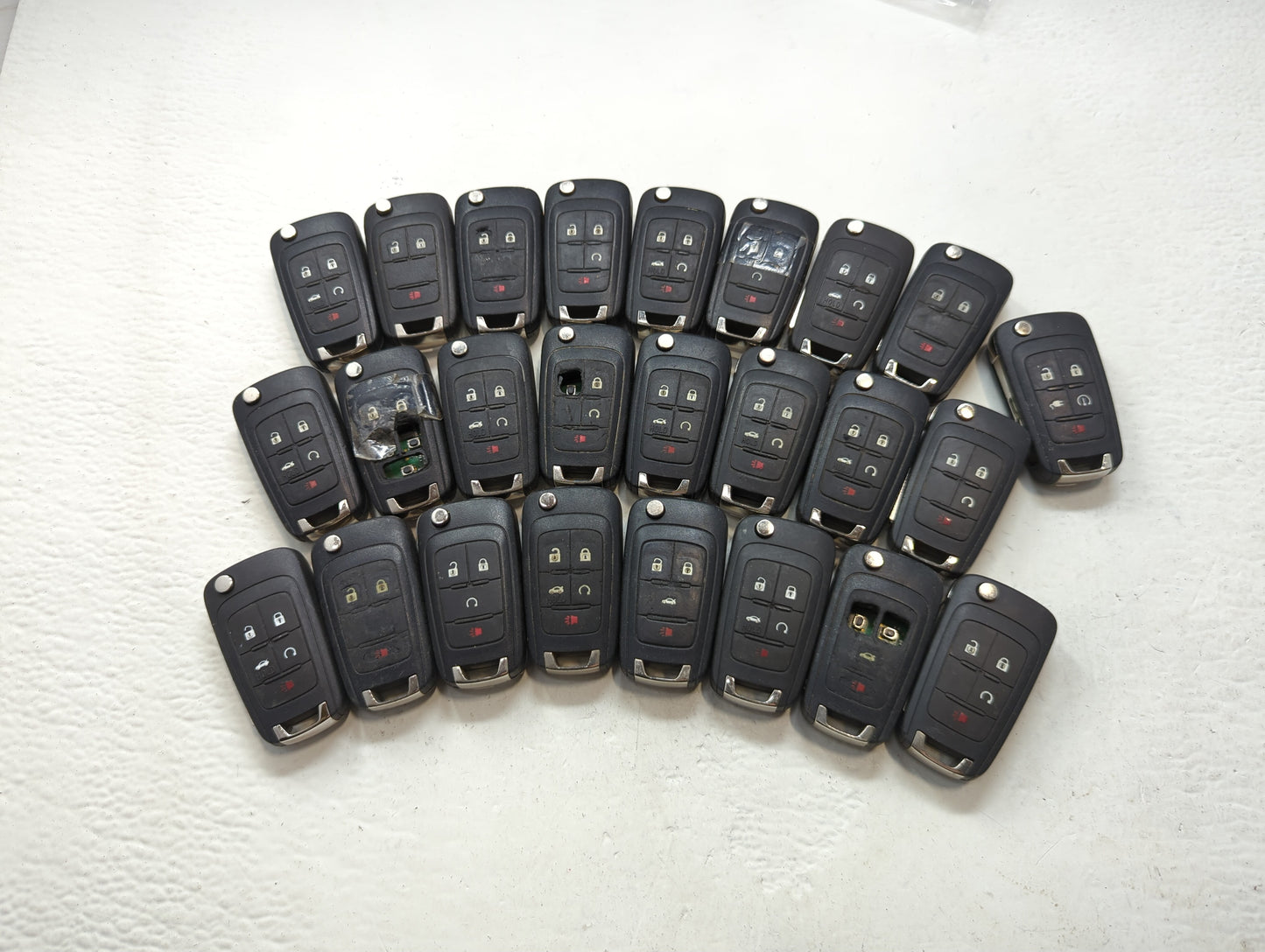 Lot of 25 Chevrolet Keyless Entry Remote Fob OHT01060512 | V2T01060512 - Oemusedautoparts1.com