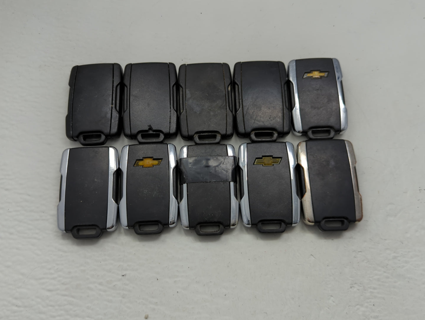 Lot of 10 Chevrolet Keyless Entry Remote Fob MIXED FCC IDS MIXED PART - Oemusedautoparts1.com