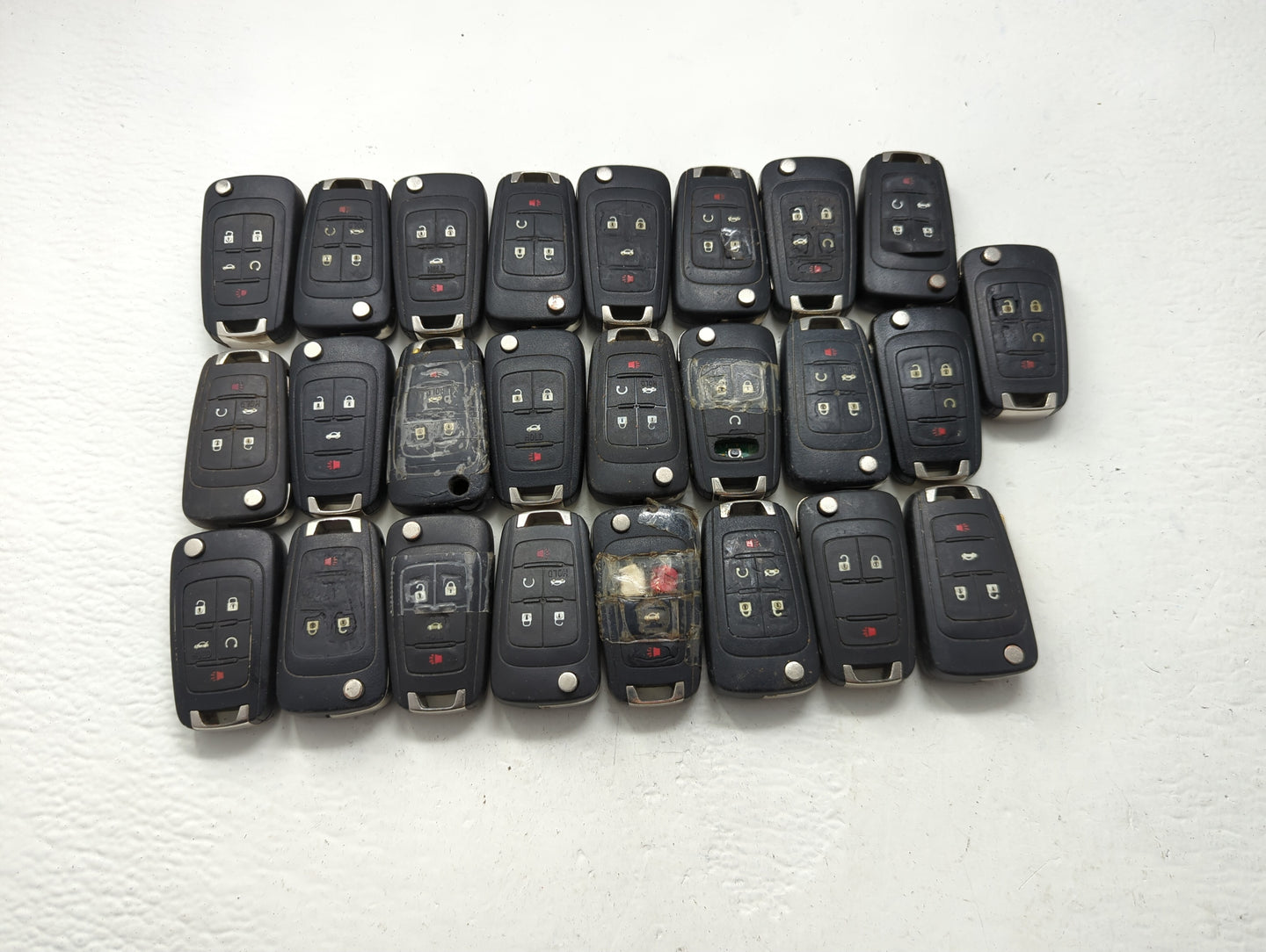 Lot of 25 Chevrolet Keyless Entry Remote Fob OHT01060512 | V2T01060512 - Oemusedautoparts1.com
