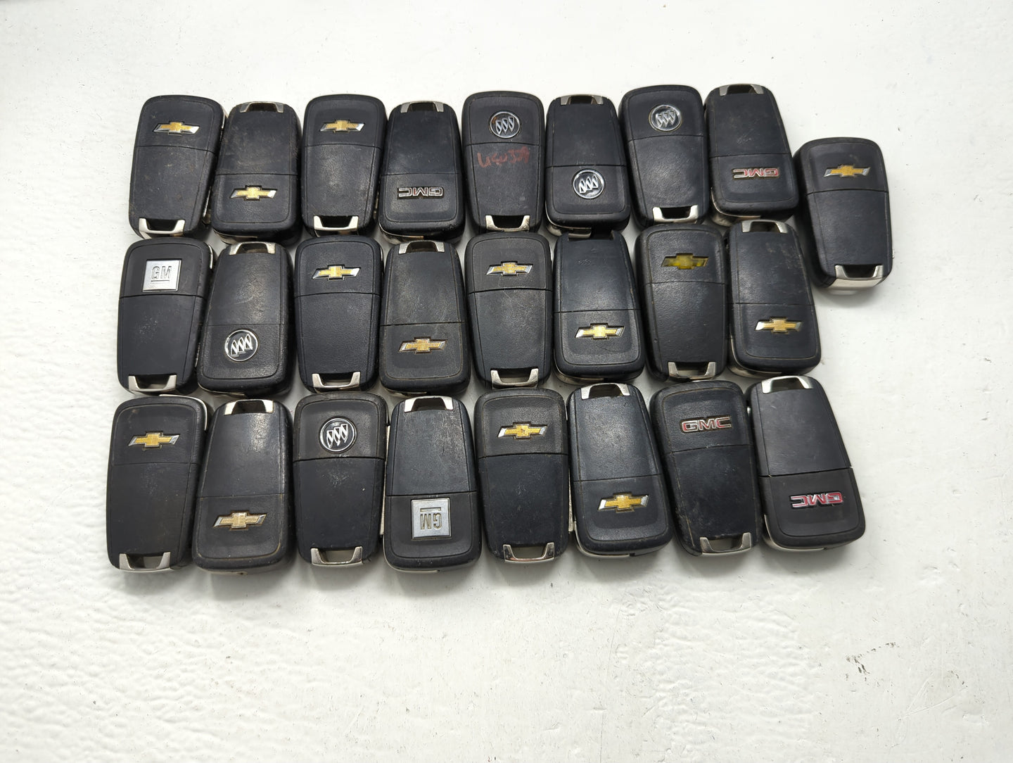 Lot of 25 Chevrolet Keyless Entry Remote Fob MIXED FCC IDS MIXED PART - Oemusedautoparts1.com