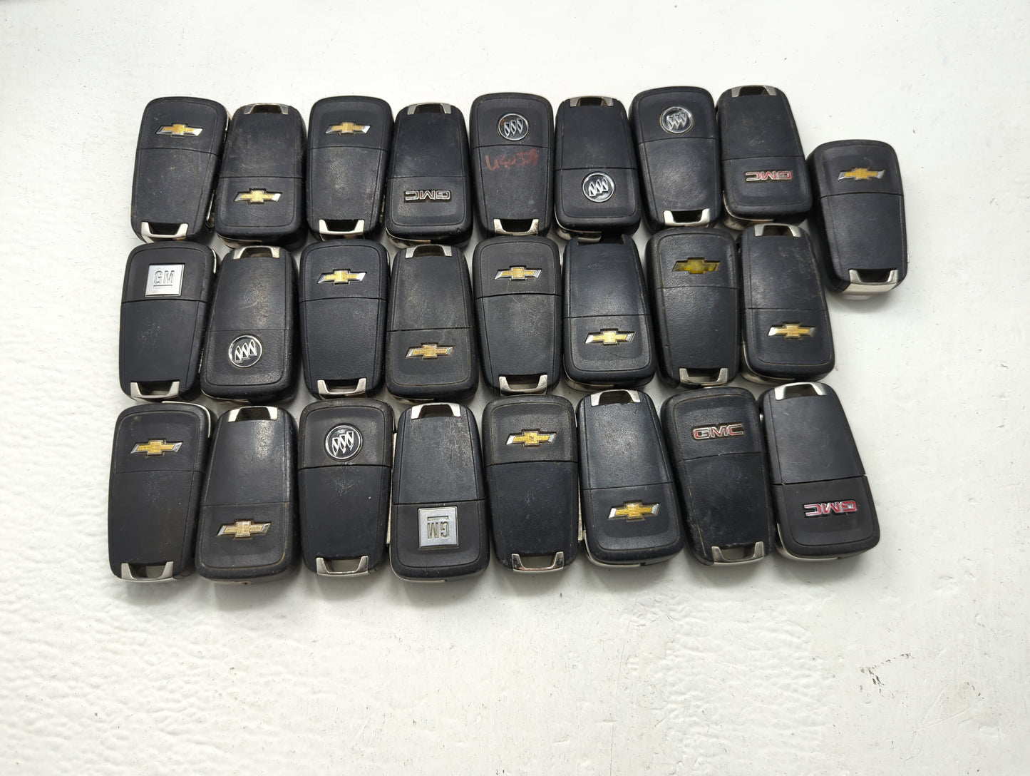 Lot of 25 Chevrolet Keyless Entry Remote Fob MIXED FCC IDS MIXED PART - Oemusedautoparts1.com