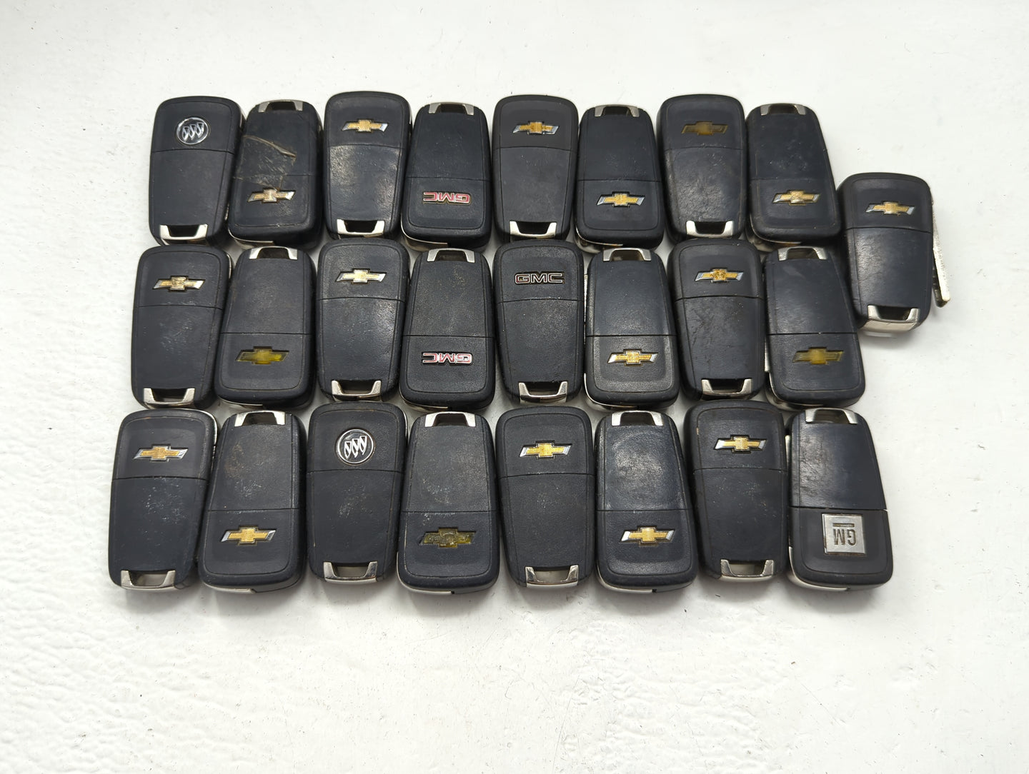Lot of 25 Chevrolet Keyless Entry Remote Fob OHT01060512 MIXED PART - Oemusedautoparts1.com