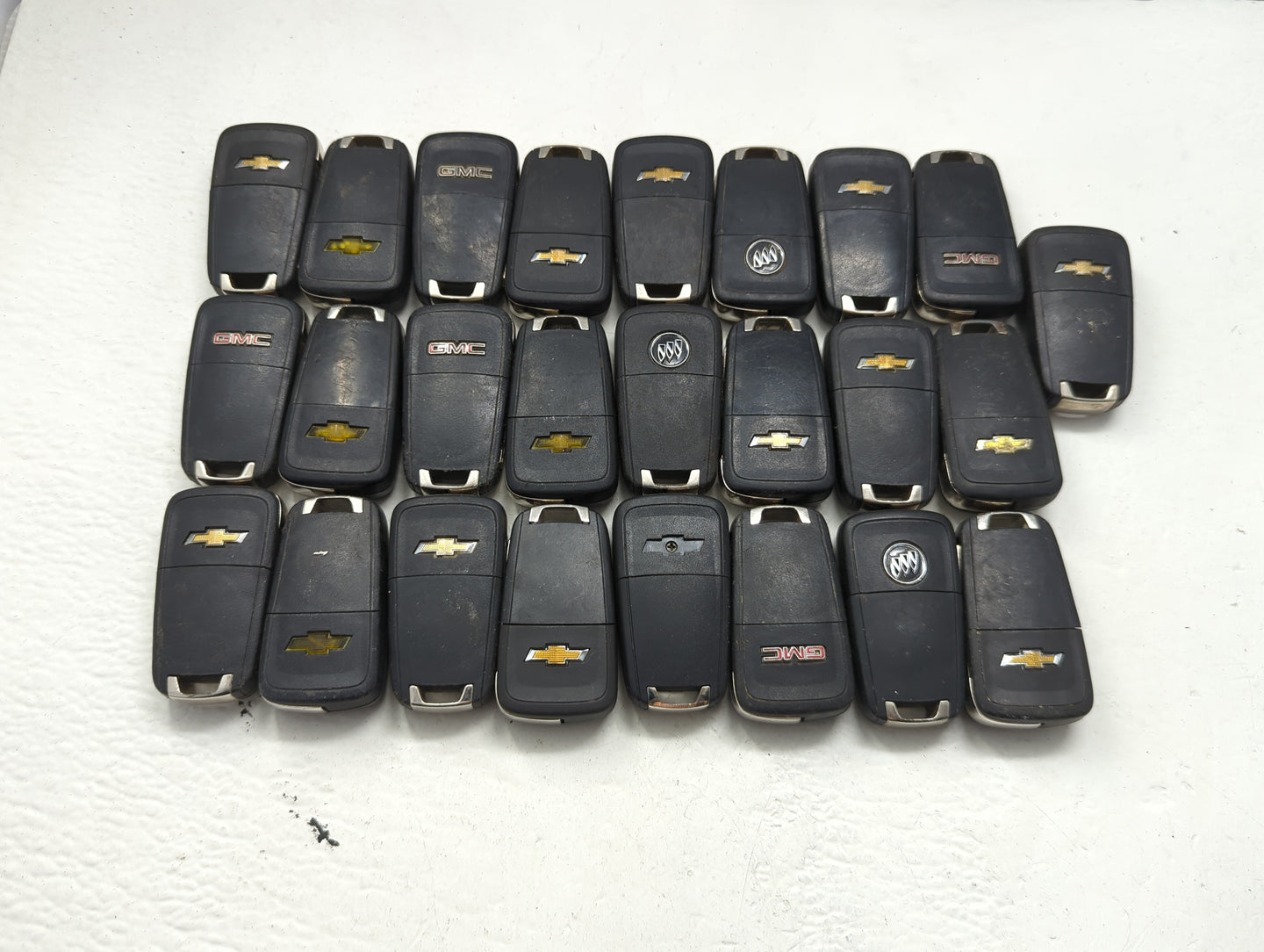 Lot of 25 Chevrolet Keyless Entry Remote Fob OHT01060512 | VT201060512 - Oemusedautoparts1.com