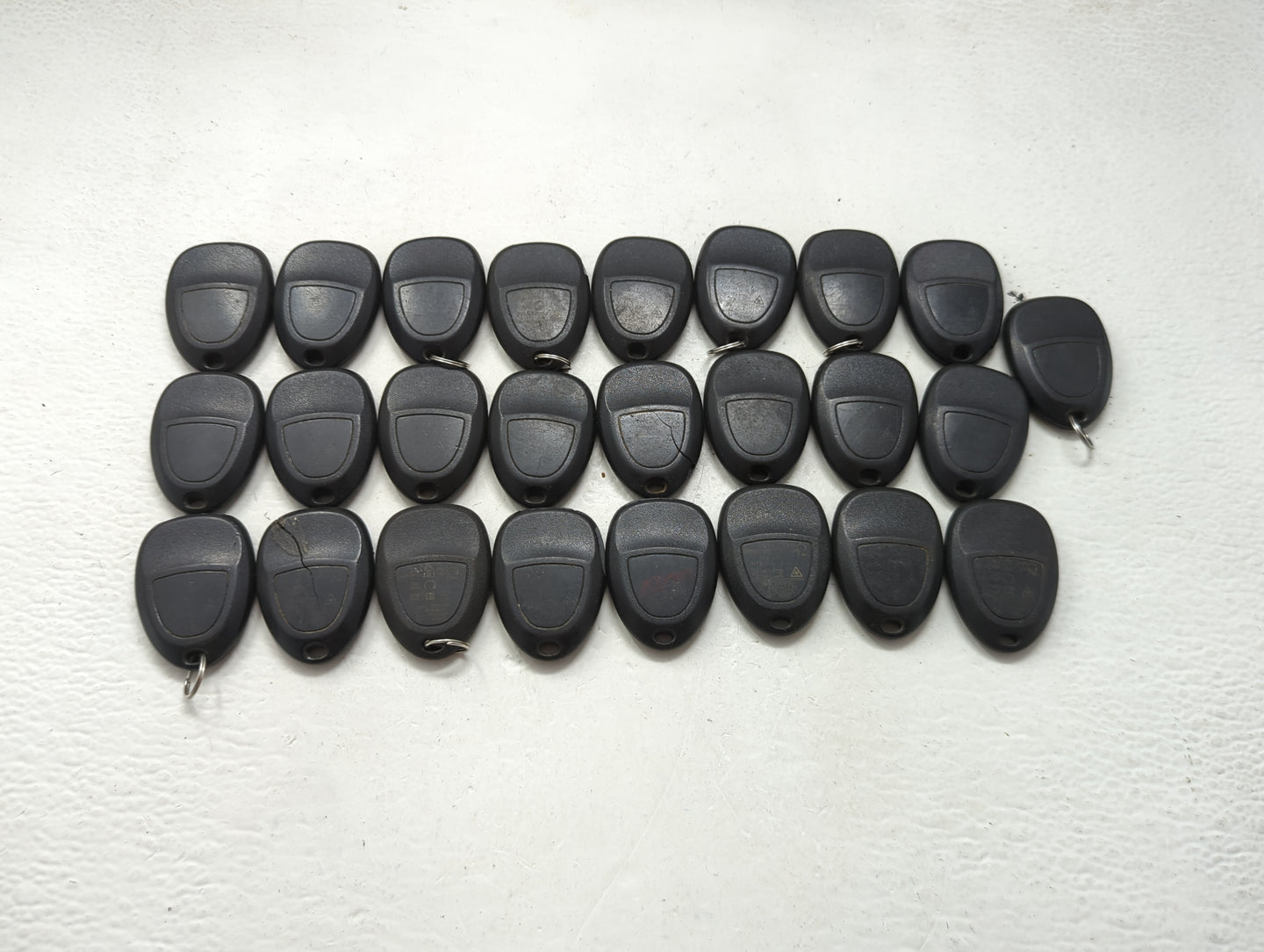 Lot of 25 Chevrolet Keyless Entry Remote Fob OUC60221 MIXED PART NUMBERS 1417932 - Oemusedautoparts1.com