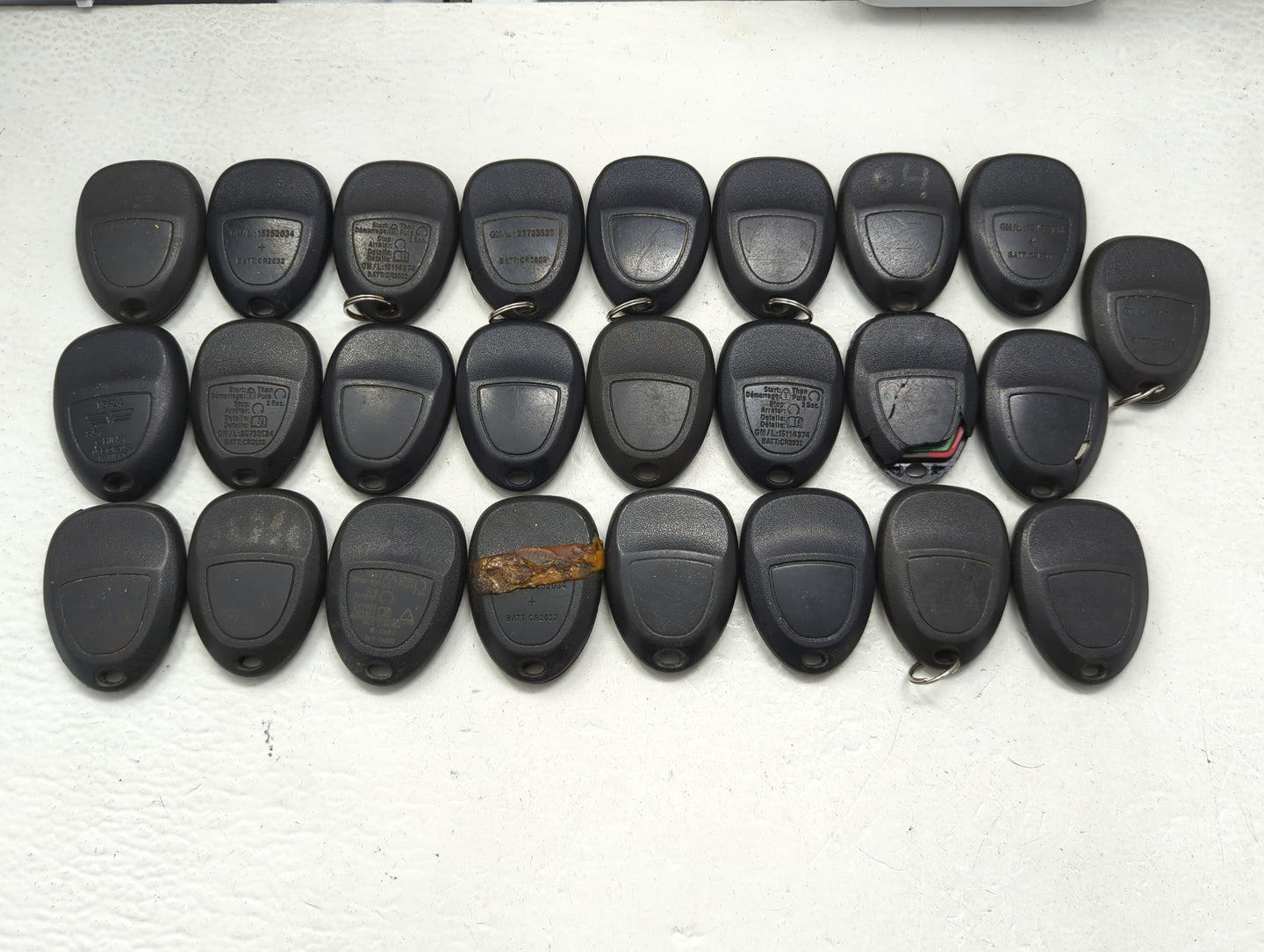 Lot of 25 Chevrolet Keyless Entry Remote Fob MIXED FCC IDS MIXED PART - Oemusedautoparts1.com