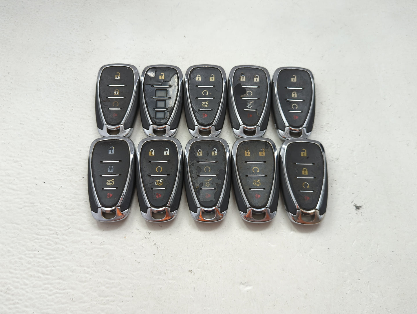 Lot of 10 Chevrolet Keyless Entry Remote Fob MIXED FCC IDS MIXED PART 1475870 - Oemusedautoparts1.com