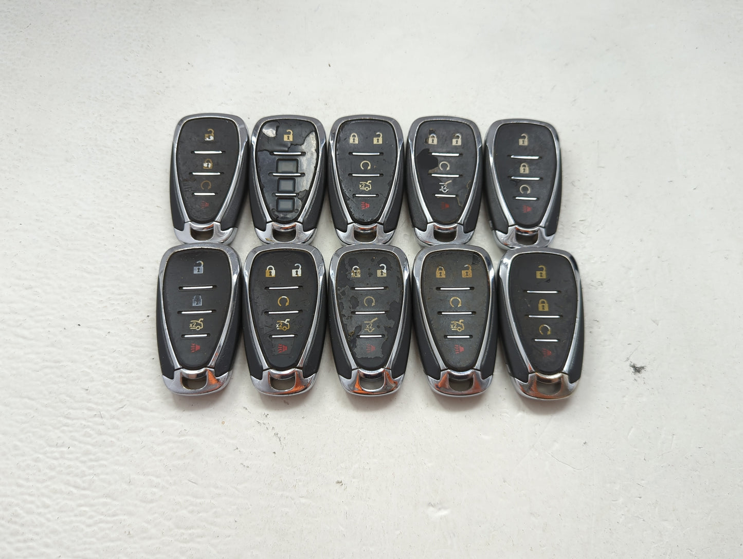 Lot of 10 Chevrolet Keyless Entry Remote Fob MIXED FCC IDS MIXED PART 1475870 - Oemusedautoparts1.com