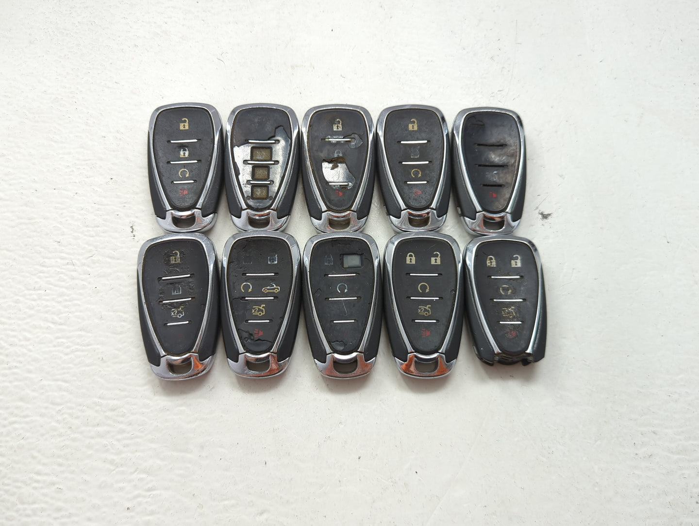 Lot of 10 Chevrolet Keyless Entry Remote Fob MIXED FCC IDS MIXED PART 1476128 - Oemusedautoparts1.com
