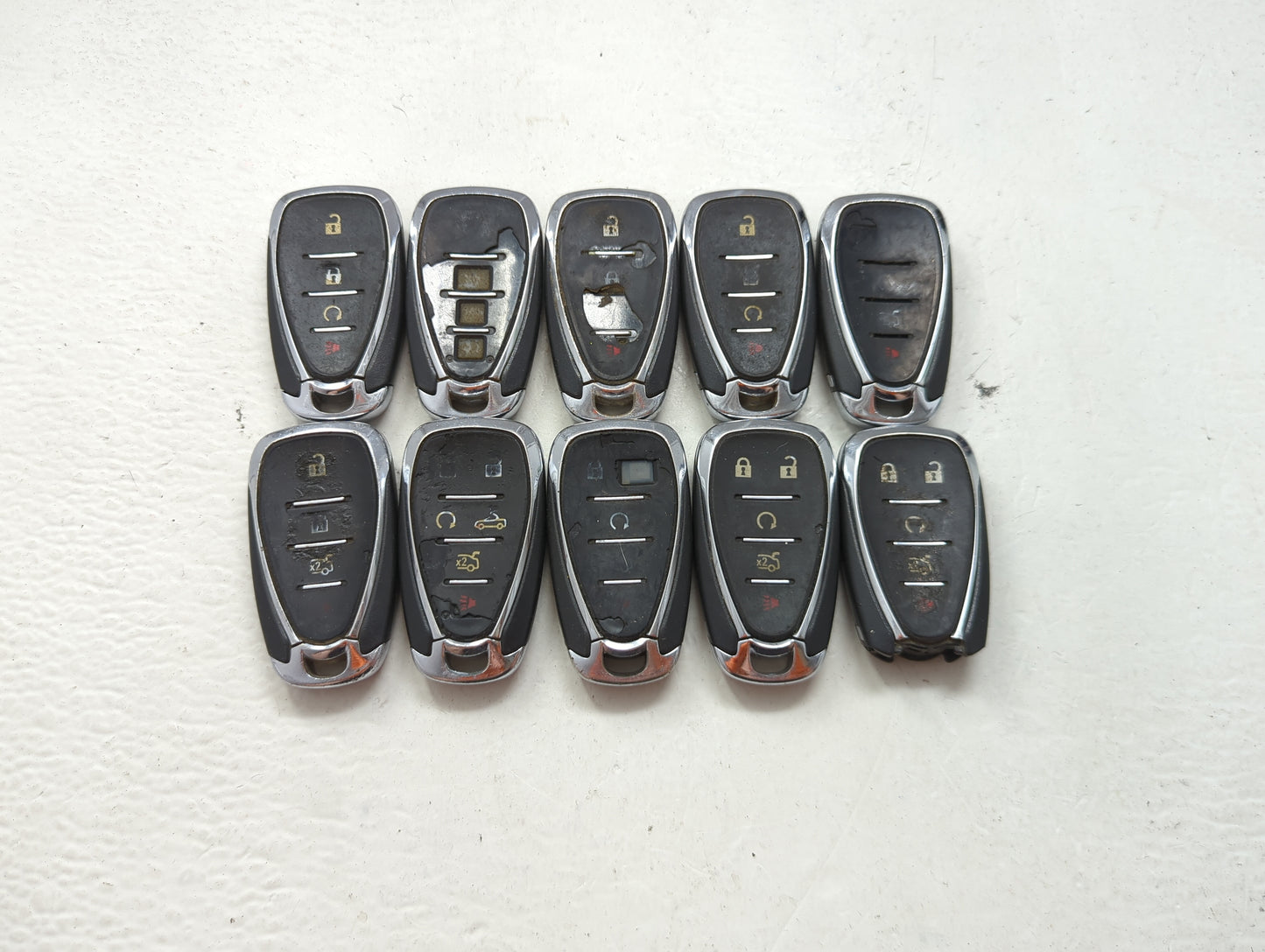 Lot of 10 Chevrolet Keyless Entry Remote Fob MIXED FCC IDS MIXED PART 1476128 - Oemusedautoparts1.com