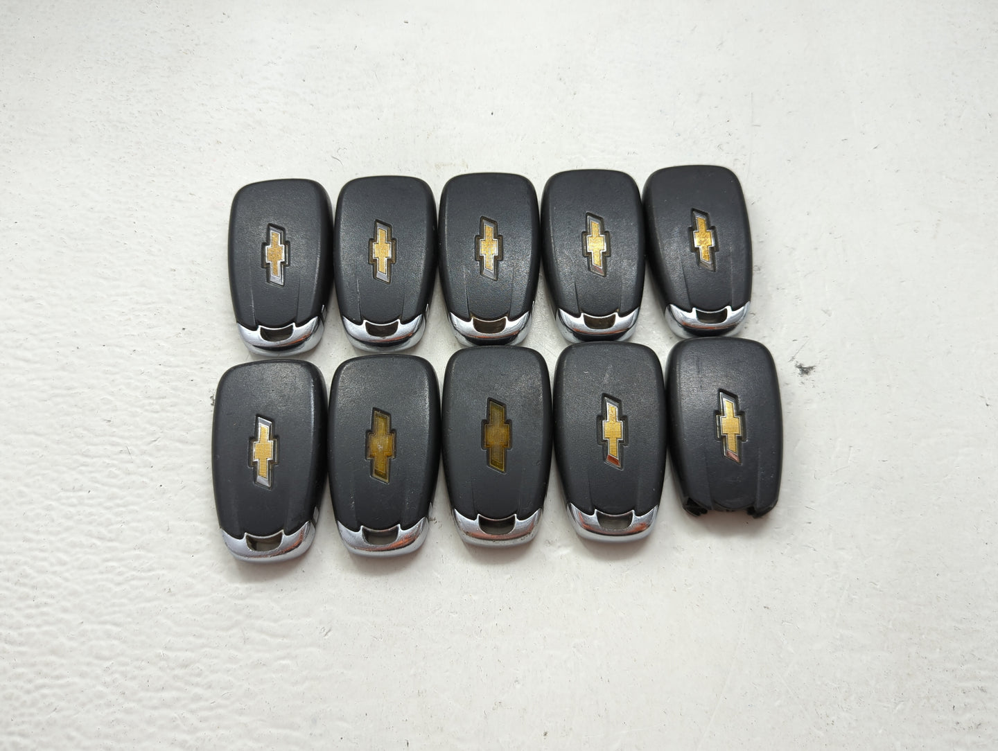 Lot of 10 Chevrolet Keyless Entry Remote Fob MIXED FCC IDS MIXED PART 1476128 - Oemusedautoparts1.com