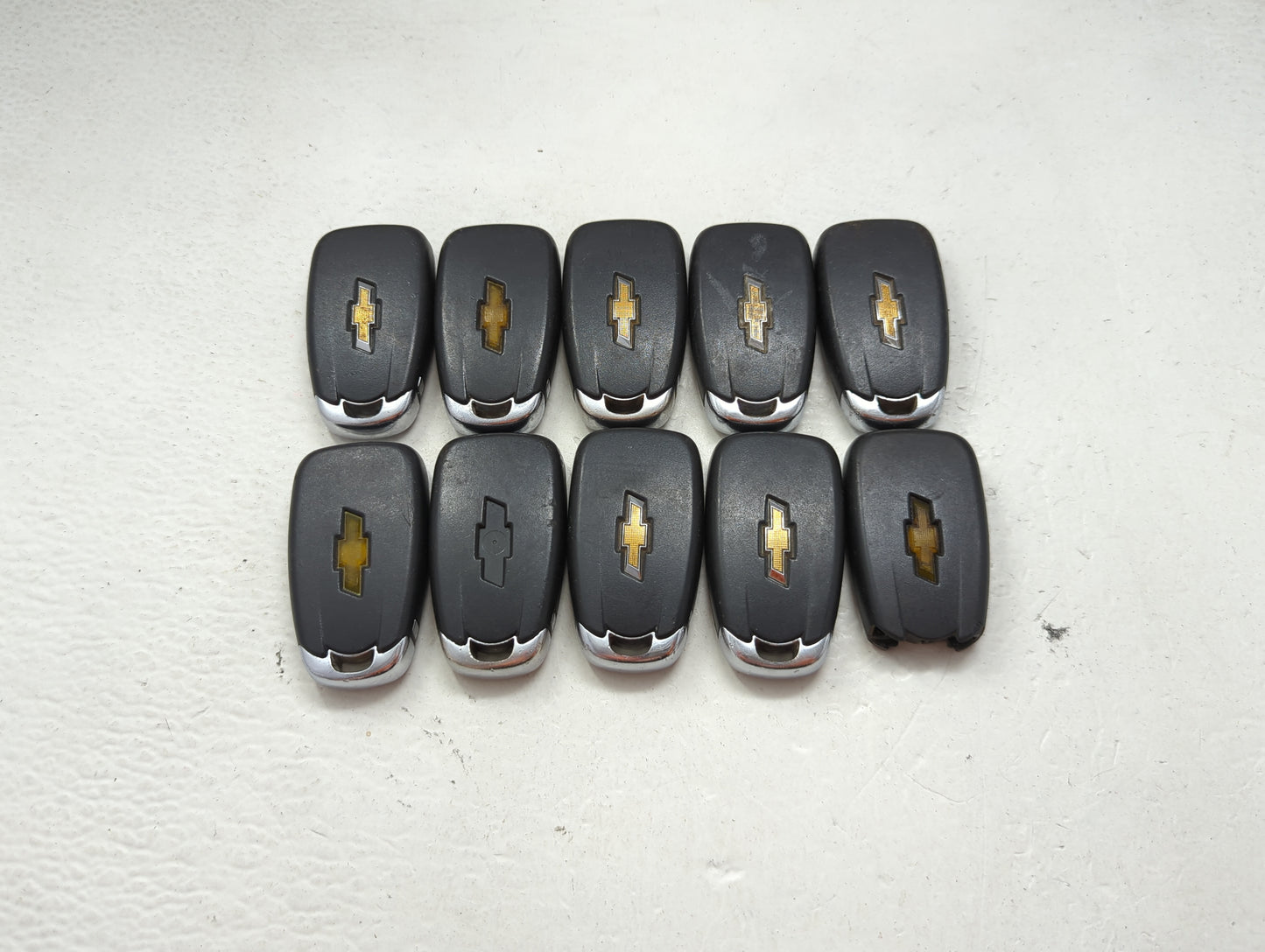 Lot of 10 Chevrolet Keyless Entry Remote Fob MIXED FCC IDS MIXED PART 1476130 - Oemusedautoparts1.com