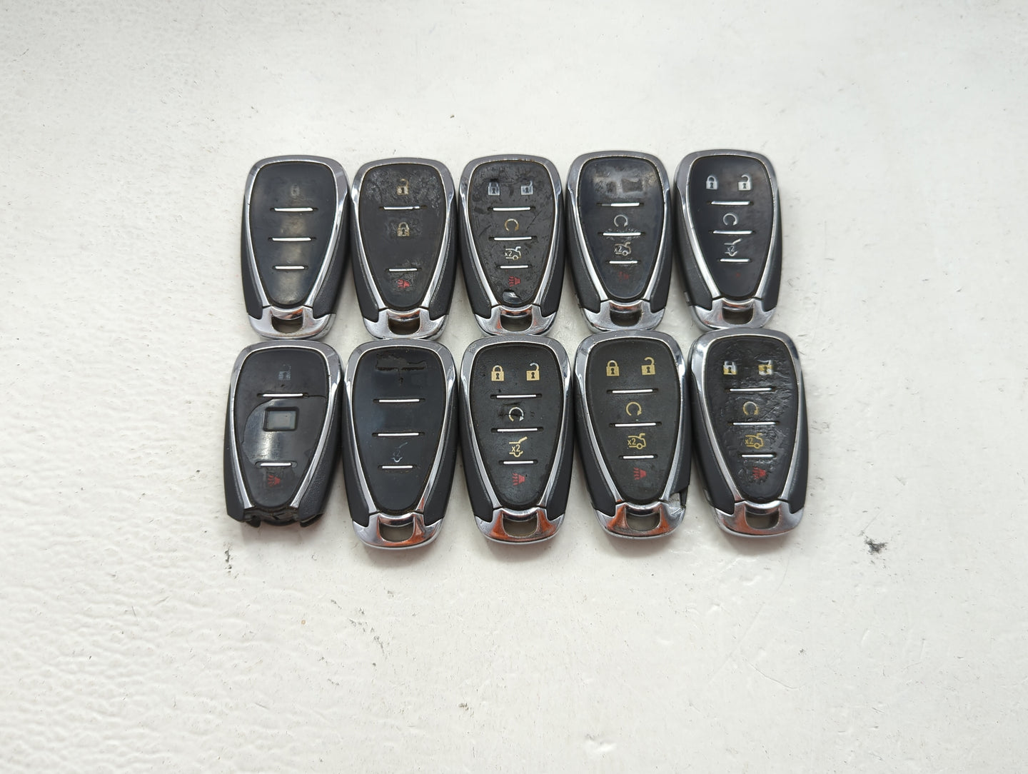 Lot of 10 Chevrolet Keyless Entry Remote Fob MIXED FCC IDS MIXED PART 1476141 - Oemusedautoparts1.com
