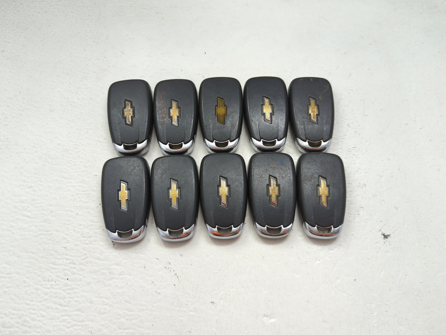 Lot of 10 Chevrolet Keyless Entry Remote Fob MIXED FCC IDS MIXED PART 1476142 - Oemusedautoparts1.com