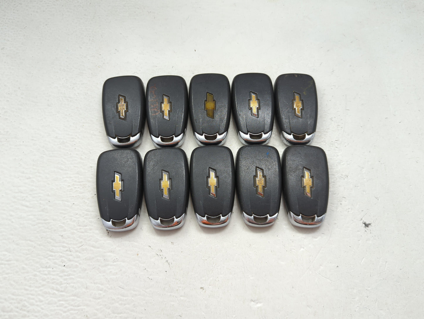 Lot of 10 Chevrolet Keyless Entry Remote Fob MIXED FCC IDS MIXED PART 1476142 - Oemusedautoparts1.com
