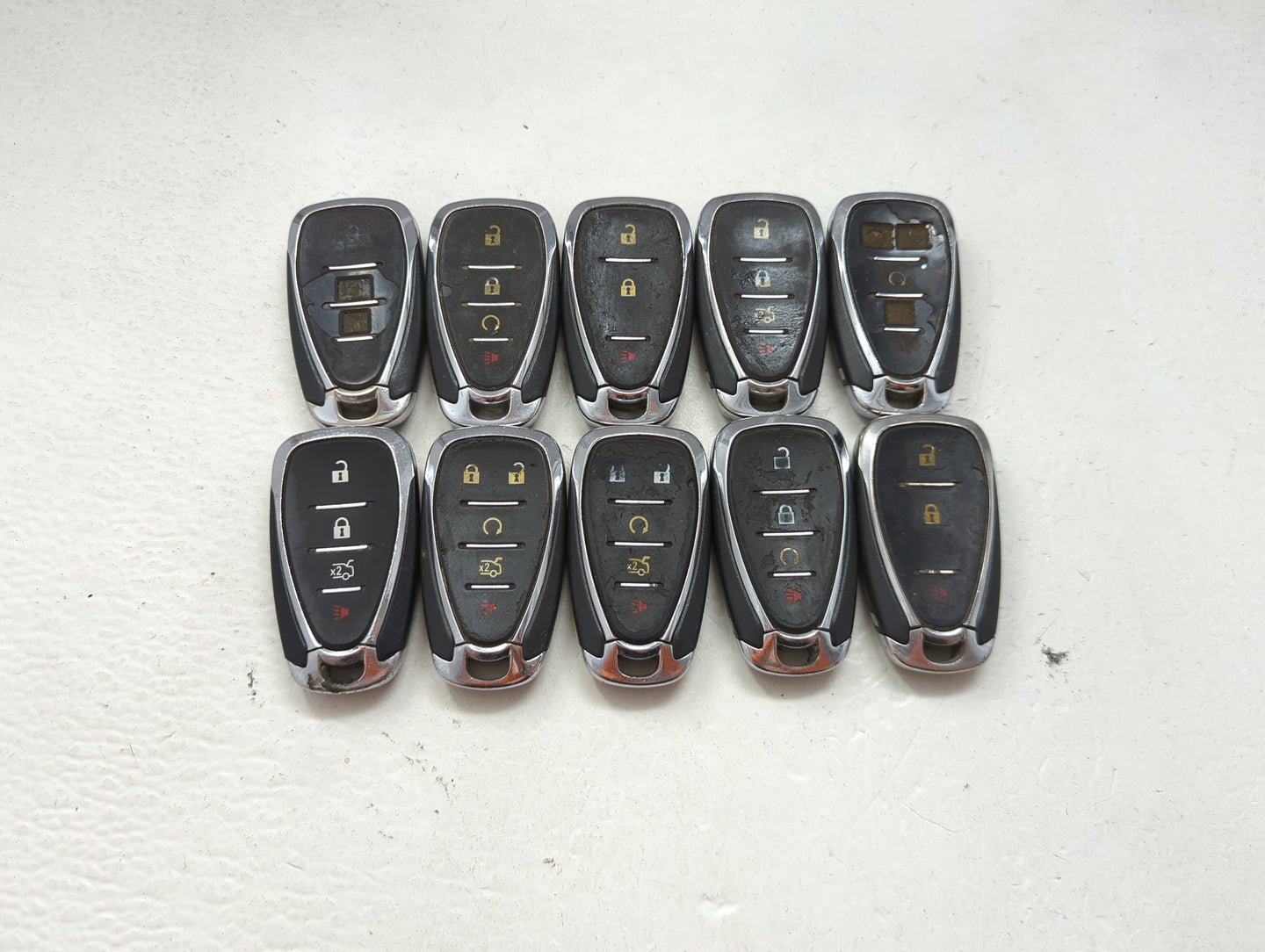 Lot of 10 Chevrolet Keyless Entry Remote Fob MIXED FCC IDS MIXED PART 1476143 - Oemusedautoparts1.com