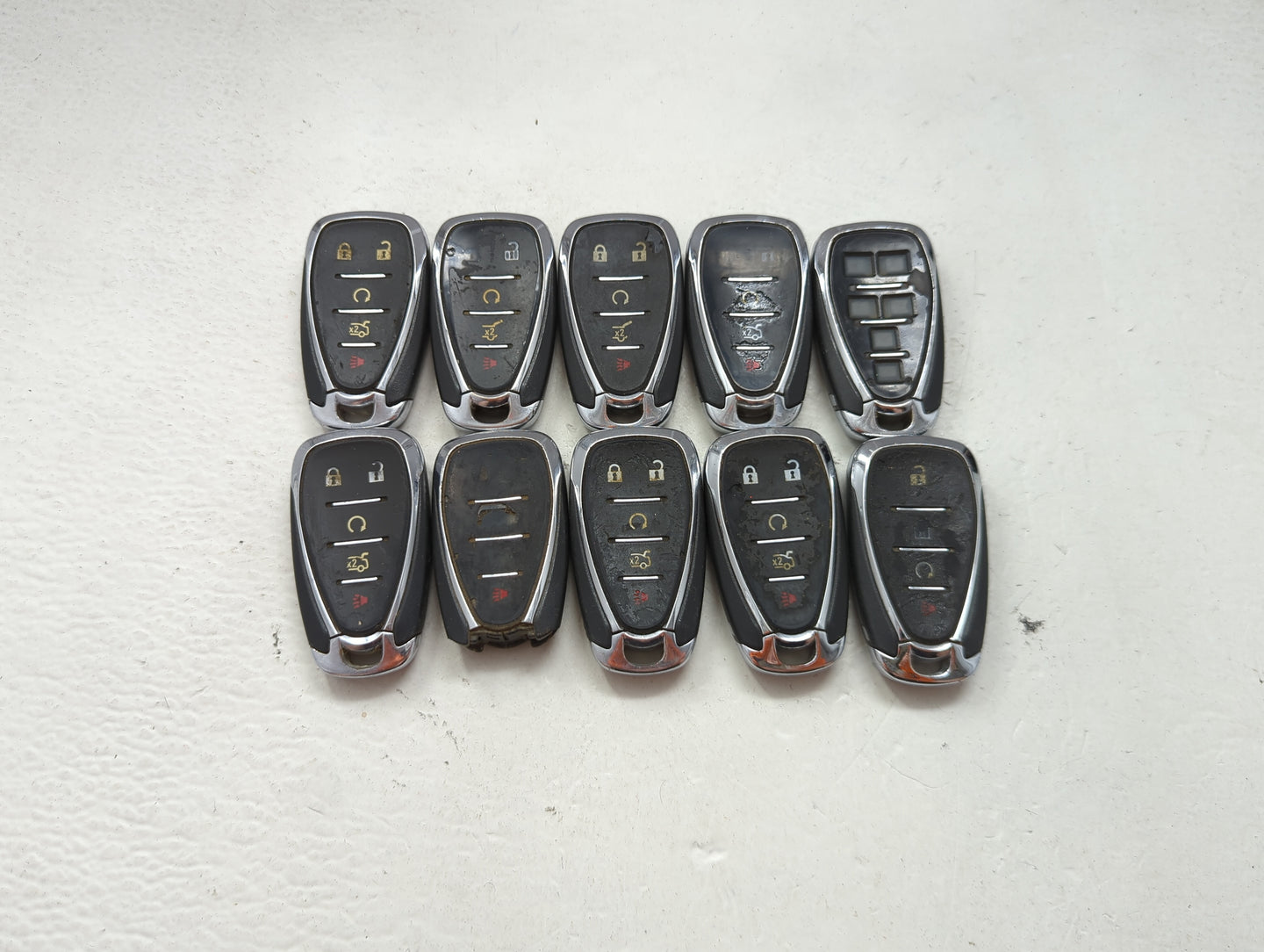 Lot of 10 Chevrolet Keyless Entry Remote Fob MIXED FCC IDS MIXED PART 1476144 - Oemusedautoparts1.com