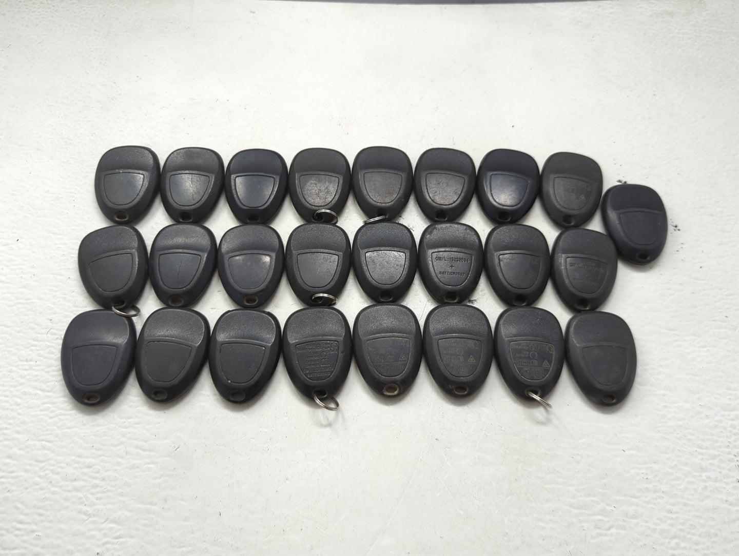 Lot of 25 Chevrolet Keyless Entry Remote Fob MIXED FCC IDS MIXED PART 1476702 - Oemusedautoparts1.com