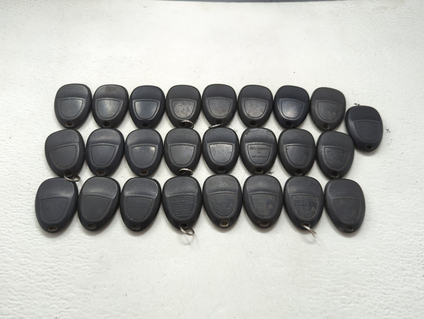 Lot of 25 Chevrolet Keyless Entry Remote Fob MIXED FCC IDS MIXED PART 1476702 - Oemusedautoparts1.com