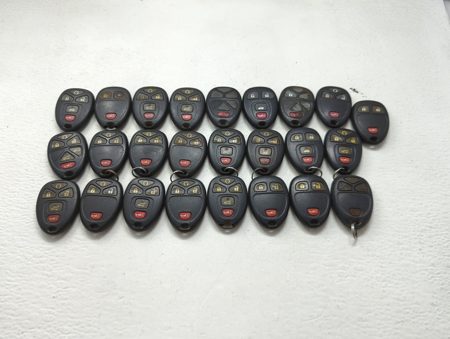 Lot of 25 Chevrolet Keyless Entry Remote Fob MIXED FCC IDS MIXED PART 1476705 - Oemusedautoparts1.com