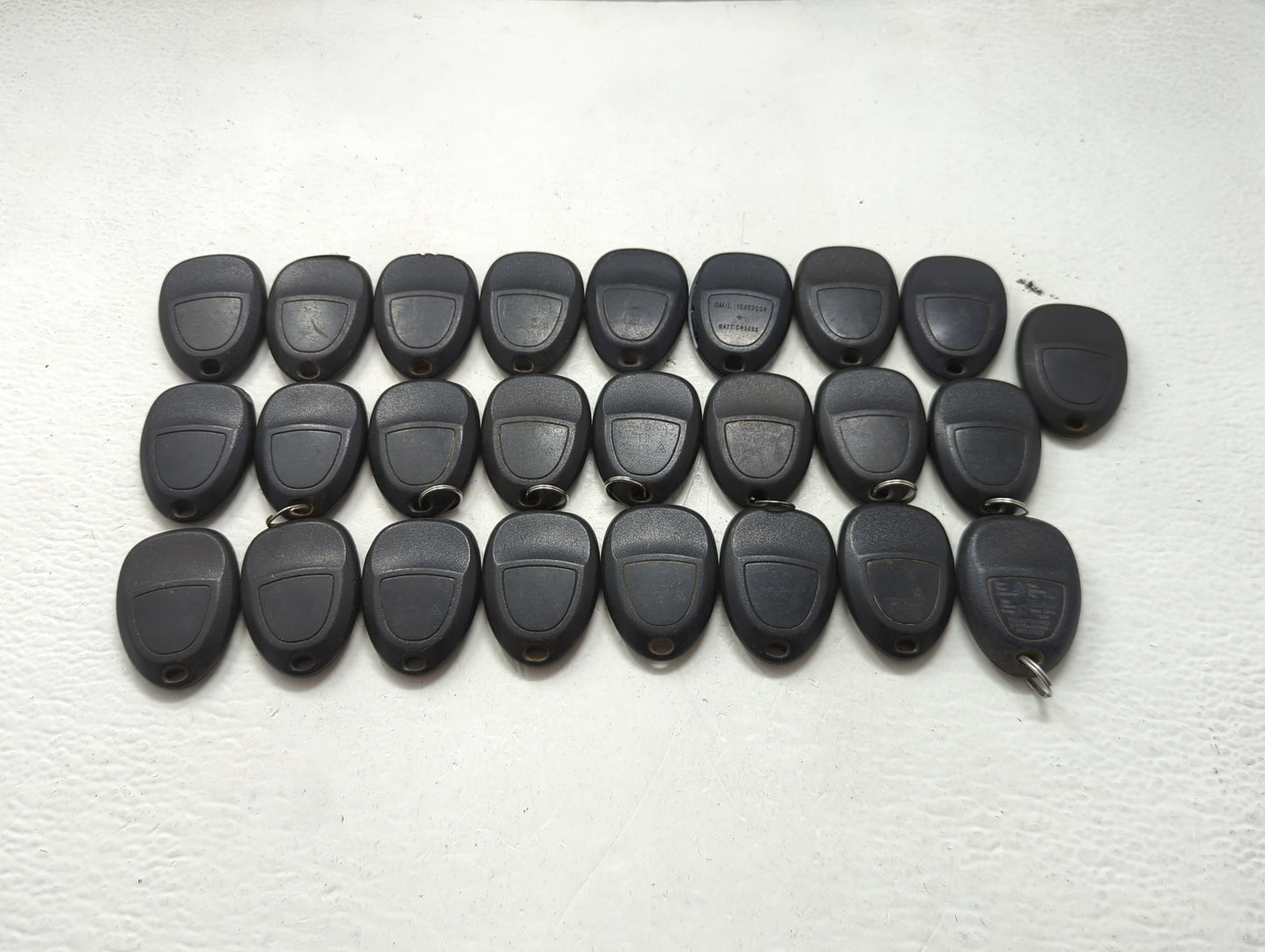 Lot of 25 Chevrolet Keyless Entry Remote Fob MIXED FCC IDS MIXED PART 1476705 - Oemusedautoparts1.com