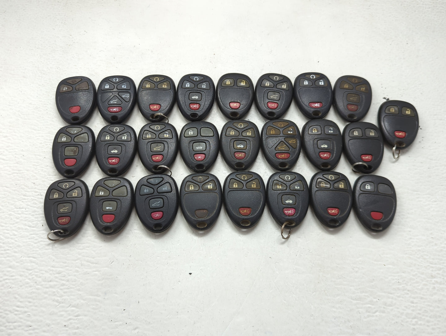 Lot of 25 Chevrolet Keyless Entry Remote Fob MIXED FCC IDS MIXED PART 1476708 - Oemusedautoparts1.com