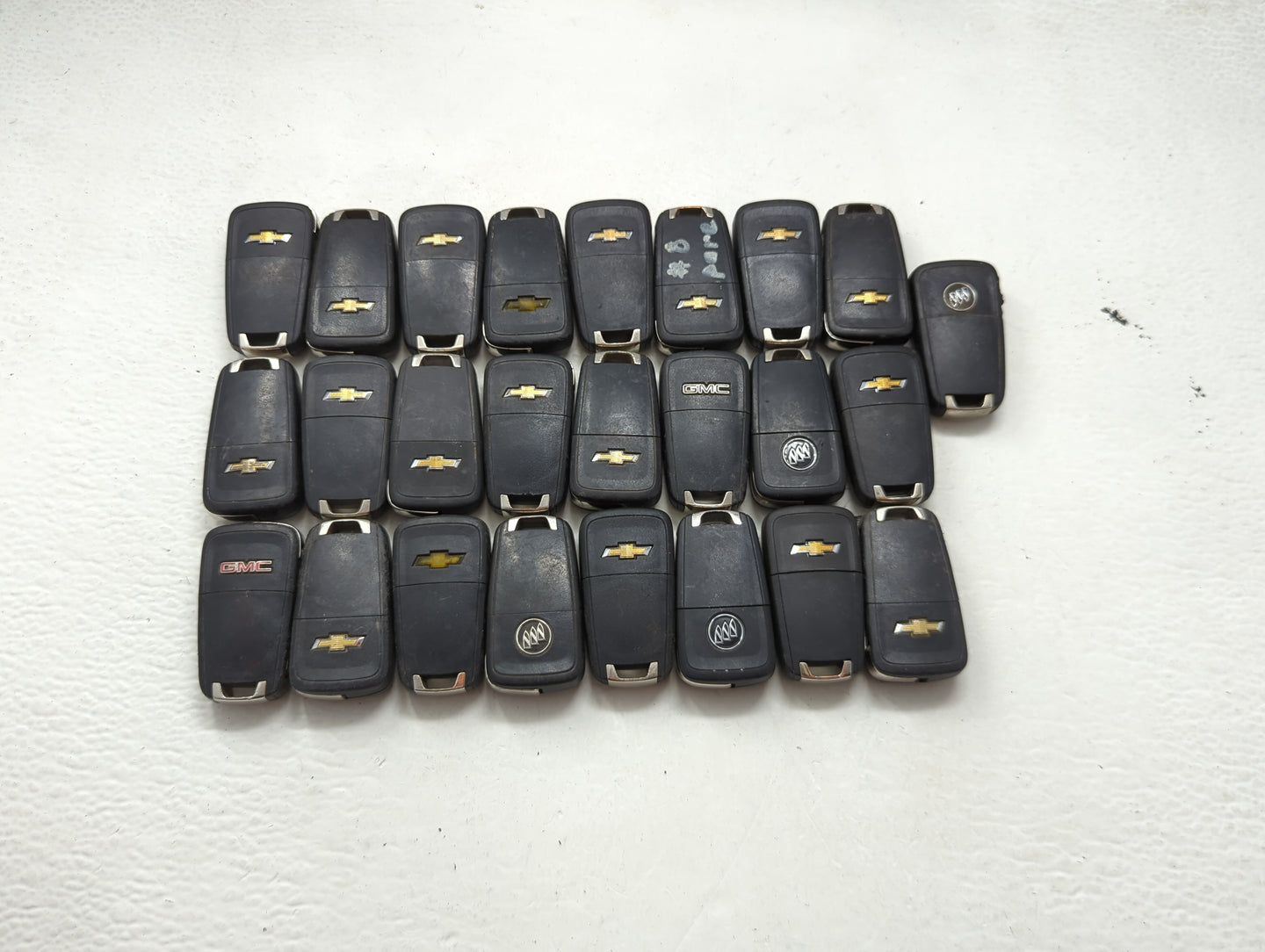 Lot of 25 Chevrolet Keyless Entry Remote Fob MIXED FCC IDS MIXED PART 1476726 - Oemusedautoparts1.com