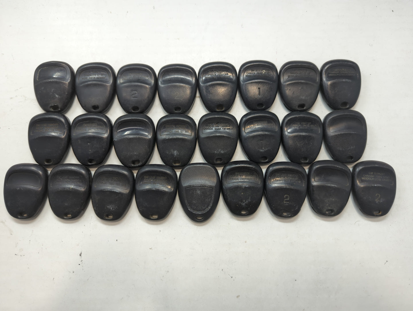 Lot of 25 Chevrolet Keyless Entry Remote Fob MIXED FCC IDS MIXED PART - Oemusedautoparts1.com