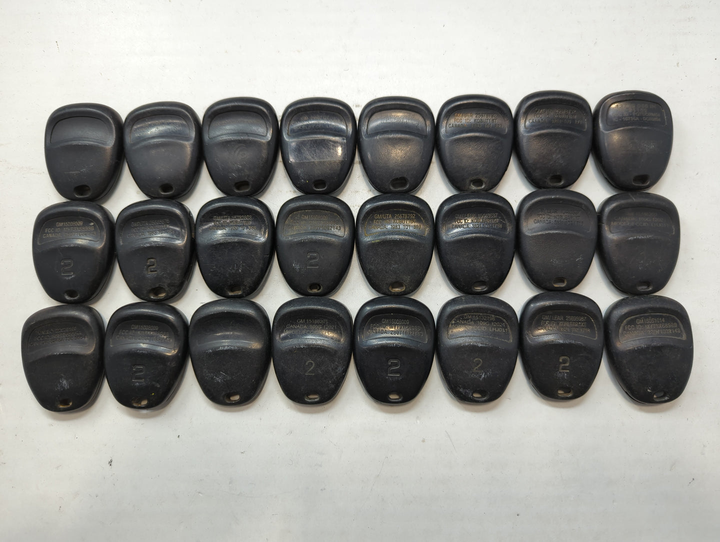 Lot of 24 Chevrolet Keyless Entry Remote Fob MIXED FCC IDS MIXED PART - Oemusedautoparts1.com