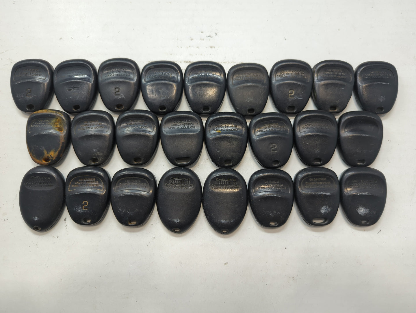 Lot of 25 Chevrolet Keyless Entry Remote Fob MIXED FCC IDS MIXED PART - Oemusedautoparts1.com