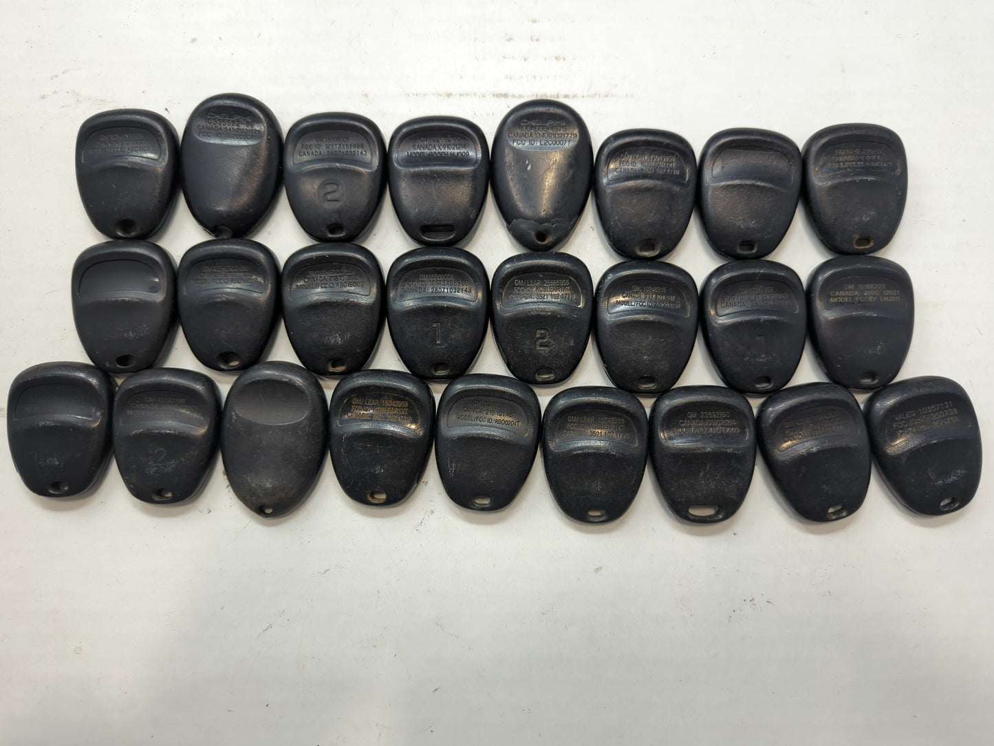 Lot of 25 Chevrolet Keyless Entry Remote Fob MIXED FCC IDS MIXED PART - Oemusedautoparts1.com