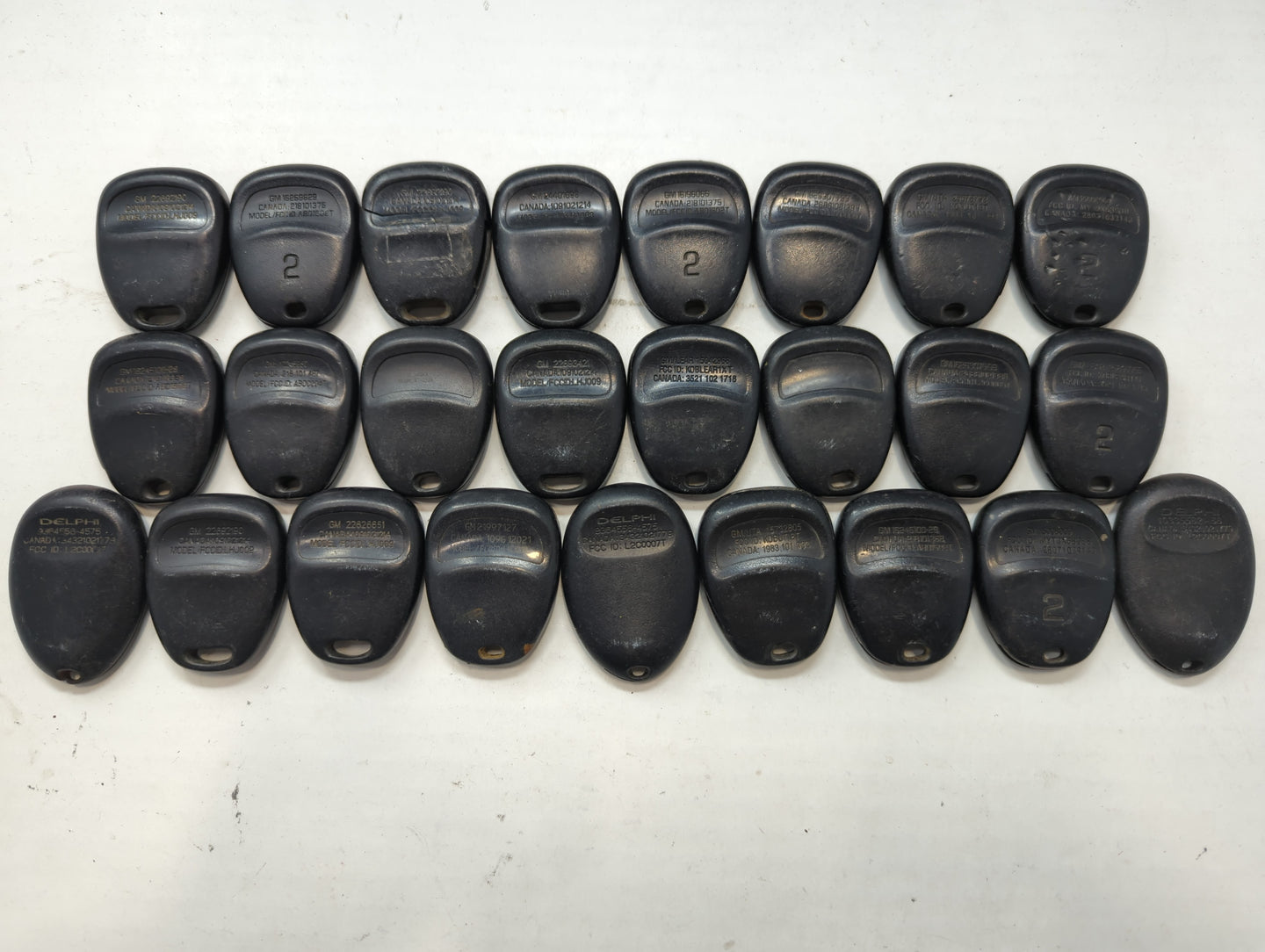 Lot of 25 Chevrolet Keyless Entry Remote Fob MIXED FCC IDS MIXED PART - Oemusedautoparts1.com
