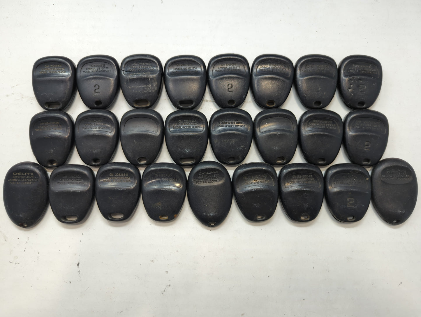 Lot of 25 Chevrolet Keyless Entry Remote Fob MIXED FCC IDS MIXED PART - Oemusedautoparts1.com