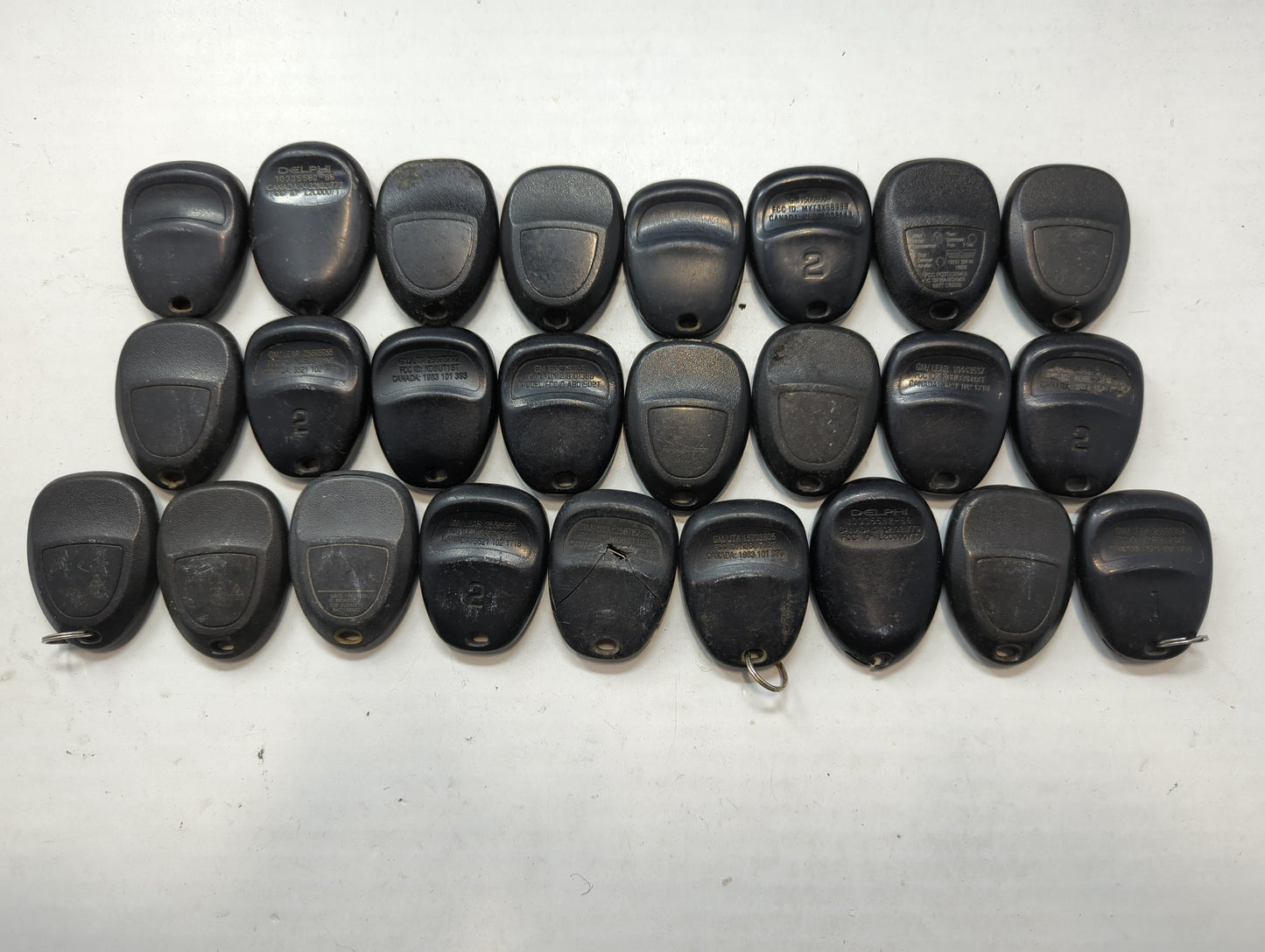 Lot of 25 Chevrolet Keyless Entry Remote Fob MIXED FCC IDS MIXED PART - Oemusedautoparts1.com