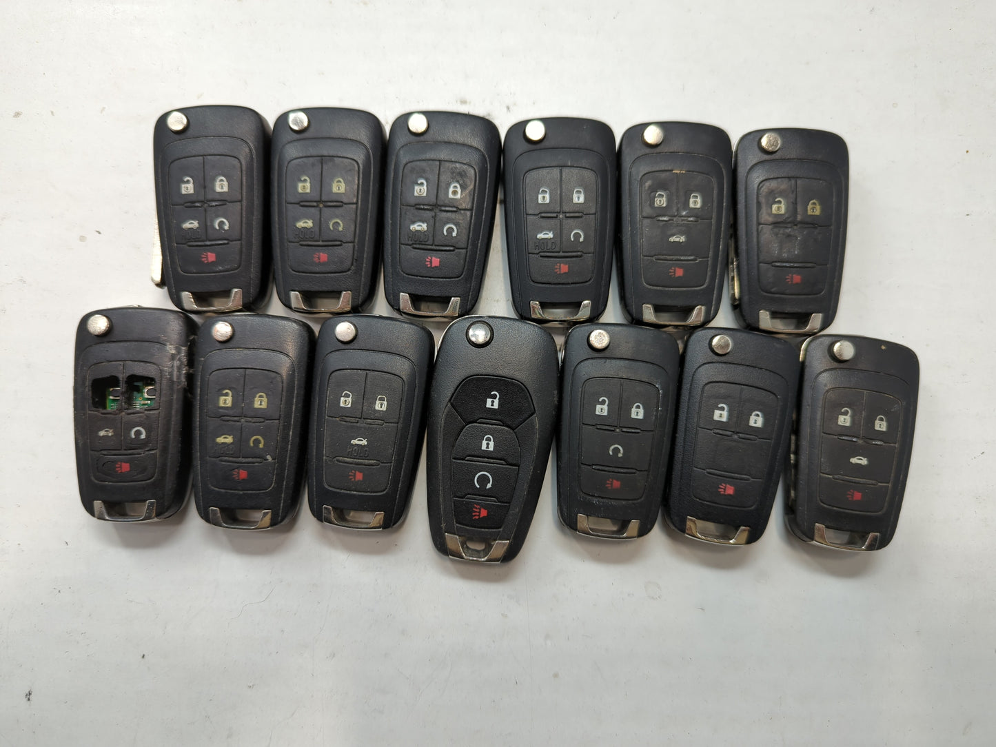 Lot of 13 Chevrolet Keyless Entry Remote Fob MIXED FCC IDS MIXED PART - Oemusedautoparts1.com