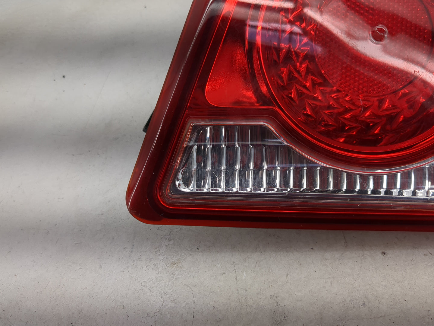 2011-2016 Chevrolet Cruze Driver Left Side Deck Lid Mounted Tail Light 5030376 - Oemusedautoparts1.com