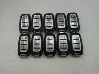 compare product Lot of 10 Chrysler Keyless Entry Remote Fob MIXED FCC IDS MIXED PART