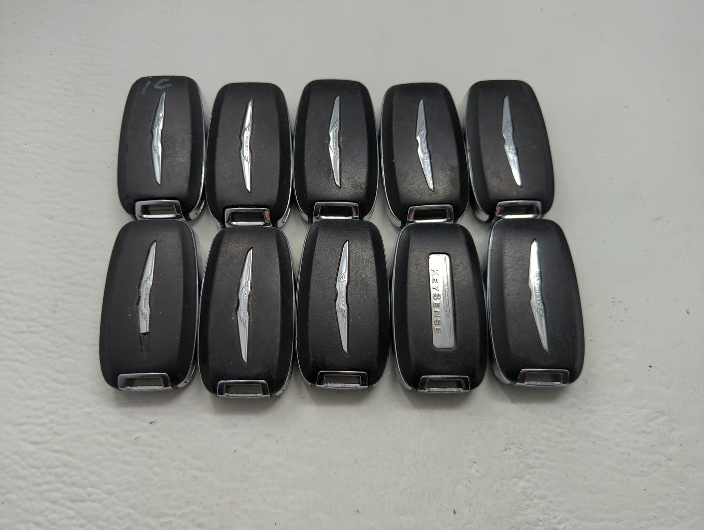 Lot of 10 Chrysler Keyless Entry Remote Fob MIXED FCC IDS MIXED PART - Oemusedautoparts1.com