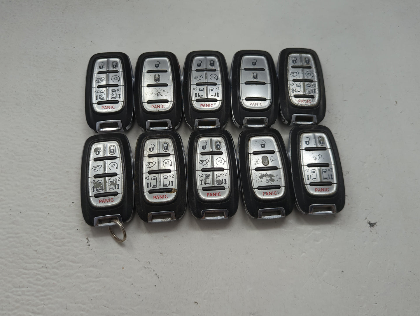 Lot of 10 Chrysler Keyless Entry Remote Fob MIXED FCC IDS MIXED PART 1475759 - Oemusedautoparts1.com