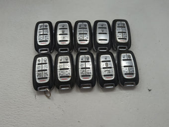 compare product Lot of 10 Chrysler Keyless Entry Remote Fob MIXED FCC IDS MIXED PART 1475759