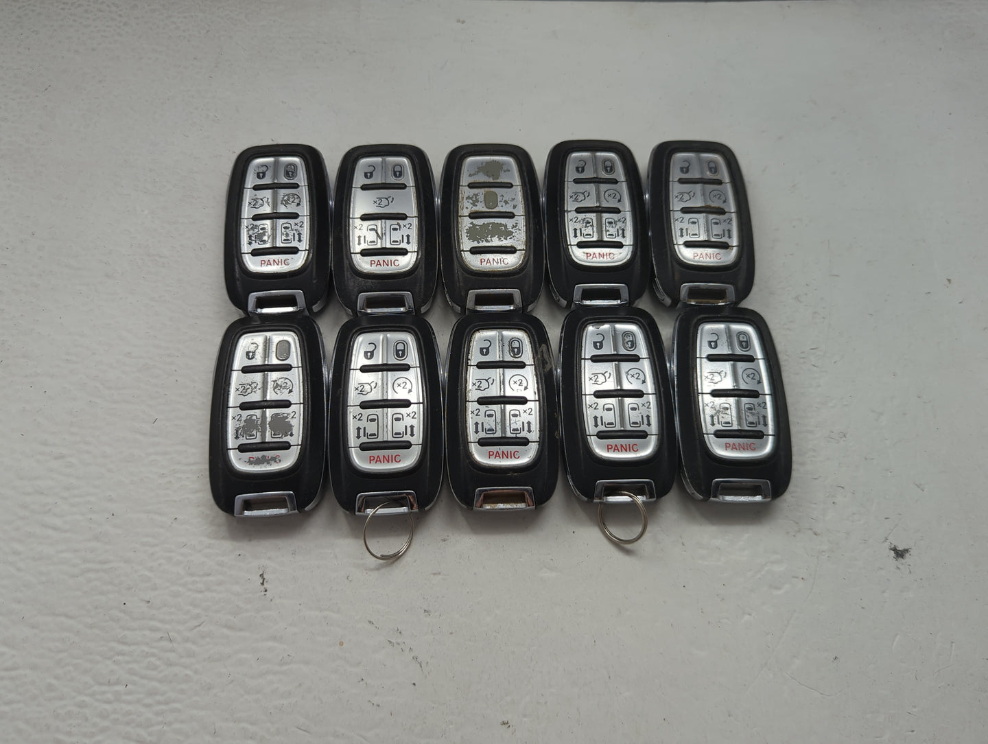 Lot of 10 Chrysler Keyless Entry Remote Fob MIXED FCC IDS MIXED PART 1475770 - Oemusedautoparts1.com
