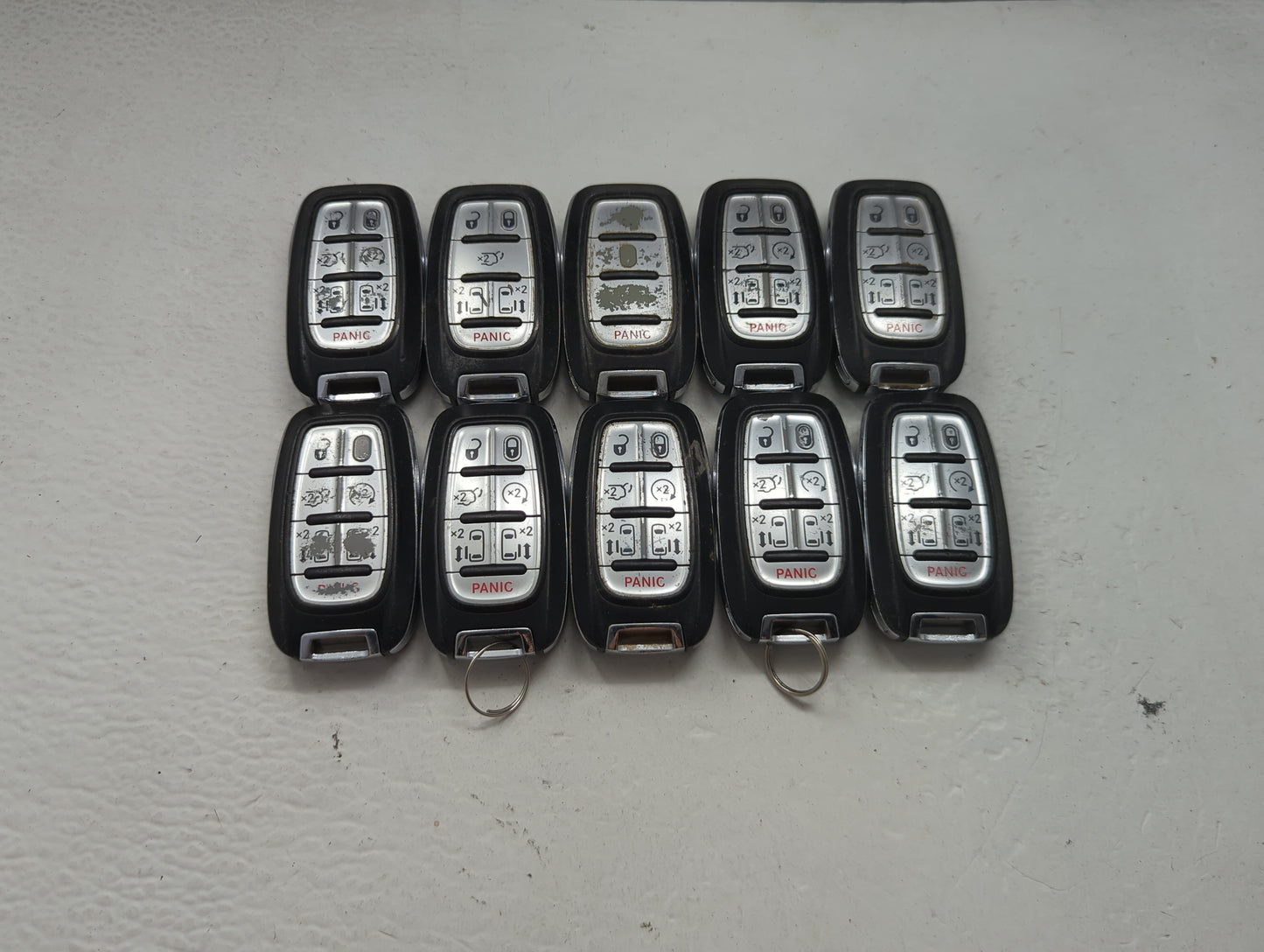 Lot of 10 Chrysler Keyless Entry Remote Fob MIXED FCC IDS MIXED PART 1475770 - Oemusedautoparts1.com