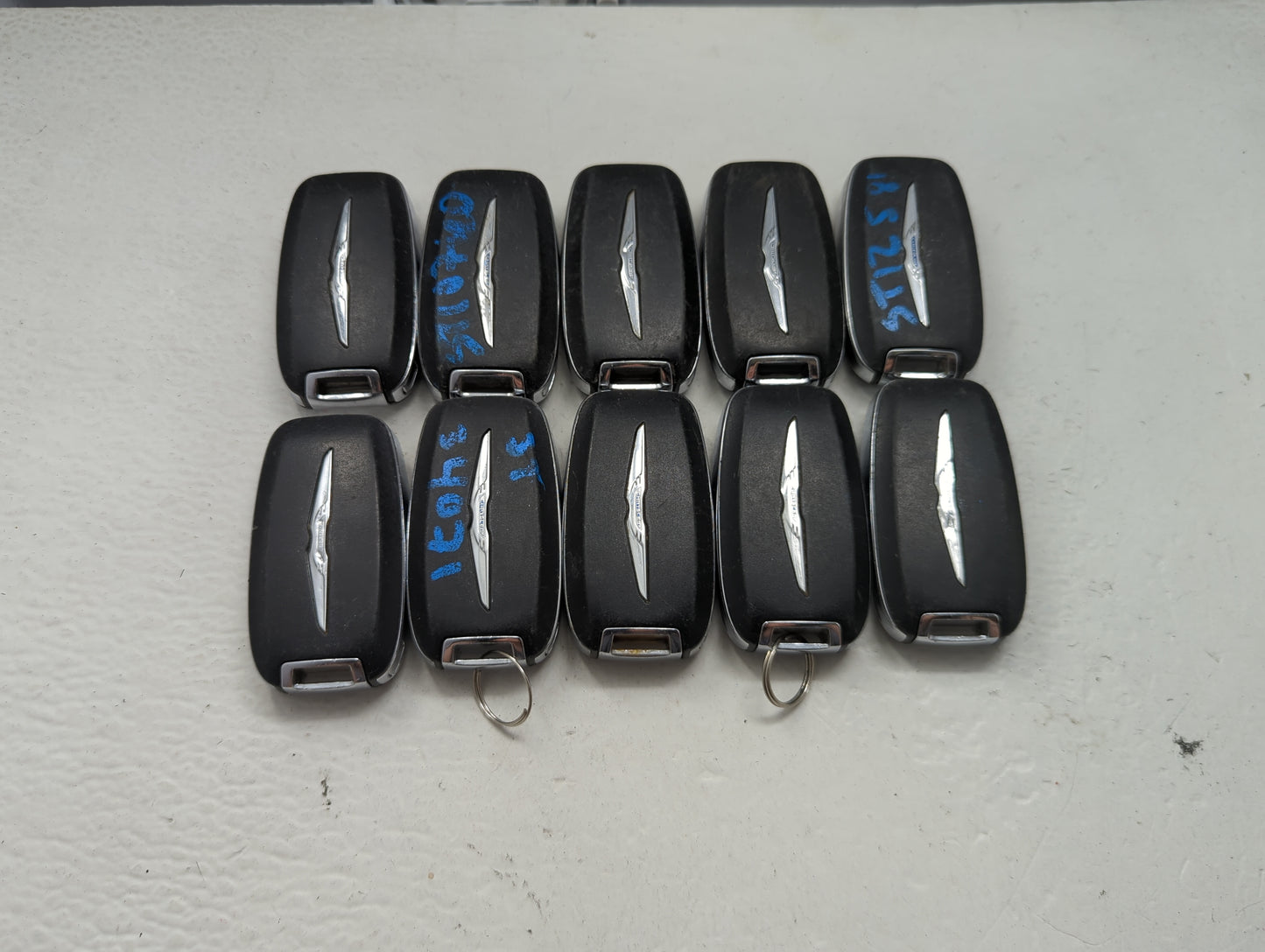 Lot of 10 Chrysler Keyless Entry Remote Fob MIXED FCC IDS MIXED PART 1475770 - Oemusedautoparts1.com