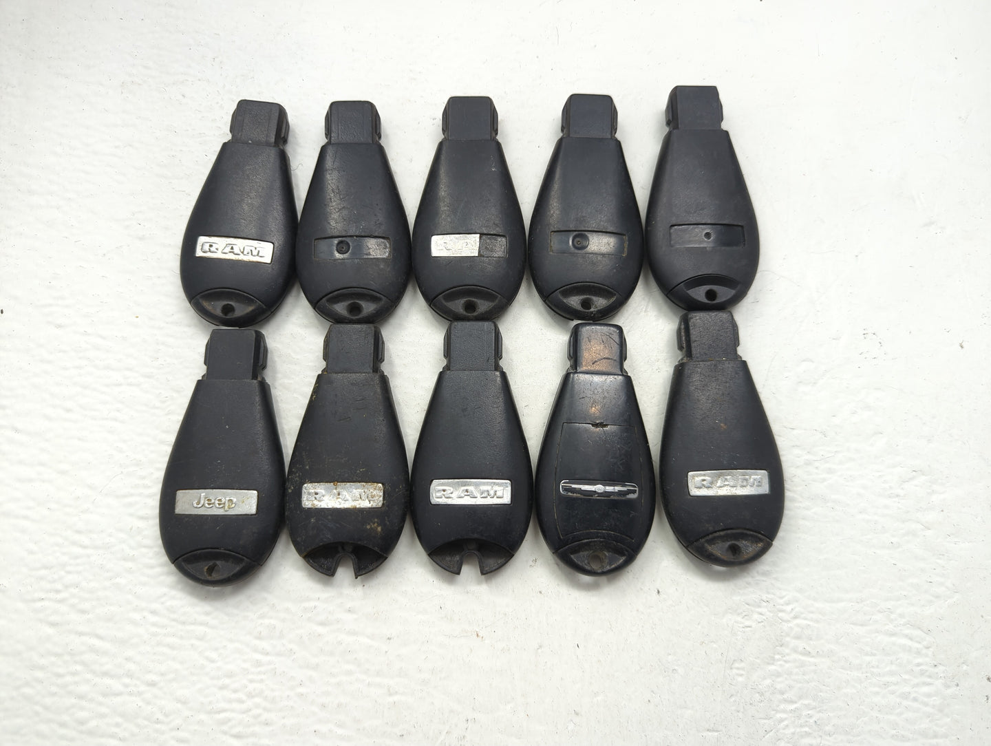 Lot of 10 Dodge Keyless Entry Remote Fob MIXED FCC IDS MIXED PART - Oemusedautoparts1.com