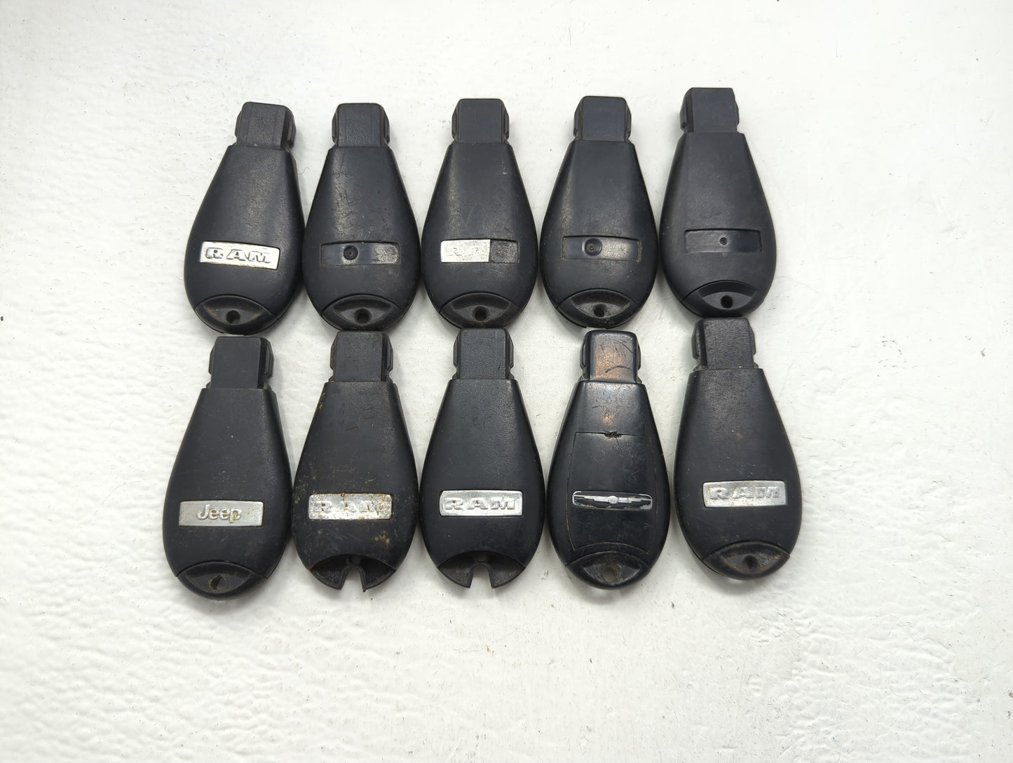 Lot of 10 Dodge Keyless Entry Remote Fob MIXED FCC IDS MIXED PART - Oemusedautoparts1.com
