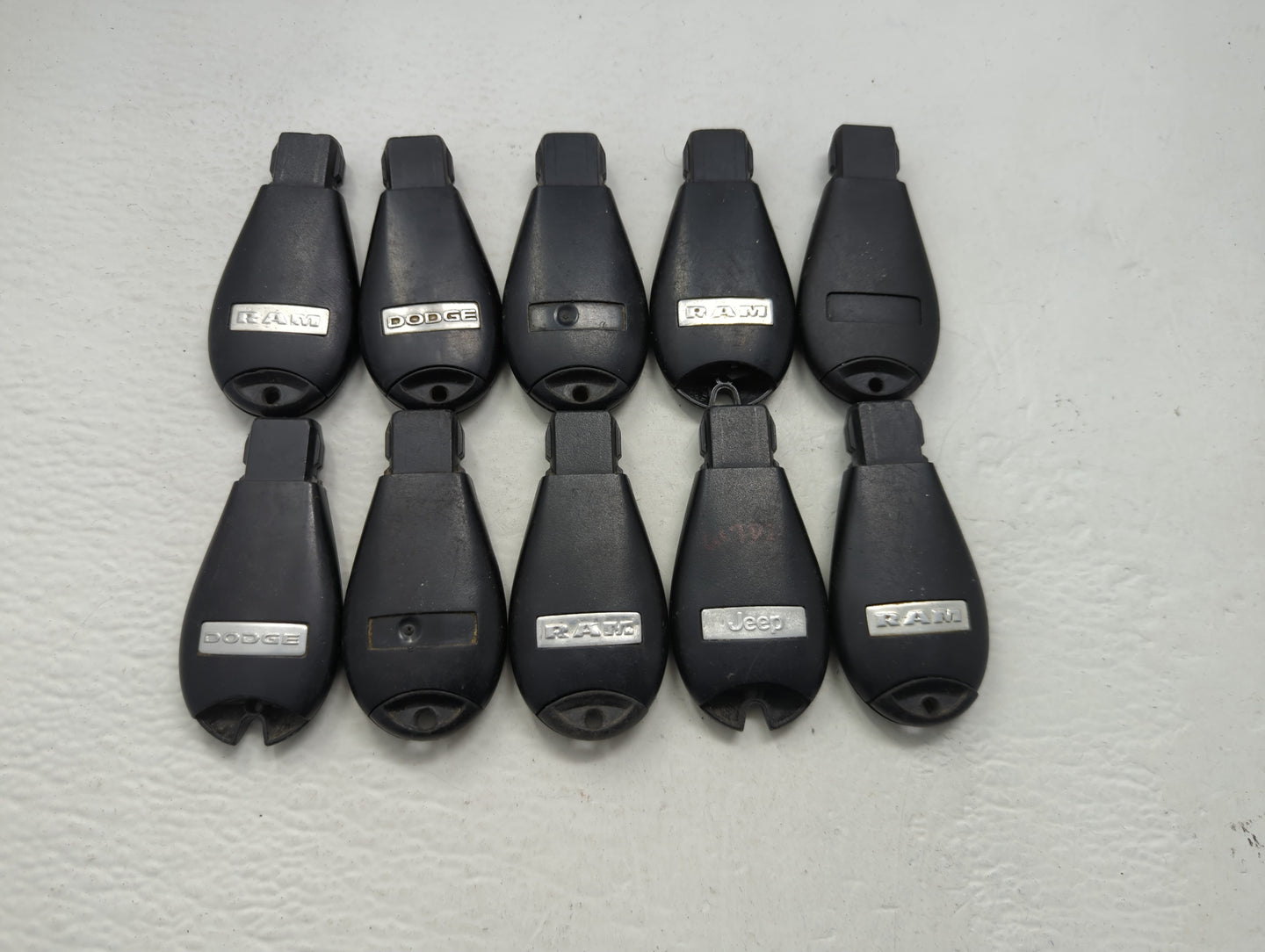 Lot of 10 Dodge Keyless Entry Remote Fob MIXED FCC IDS MIXED PART - Oemusedautoparts1.com