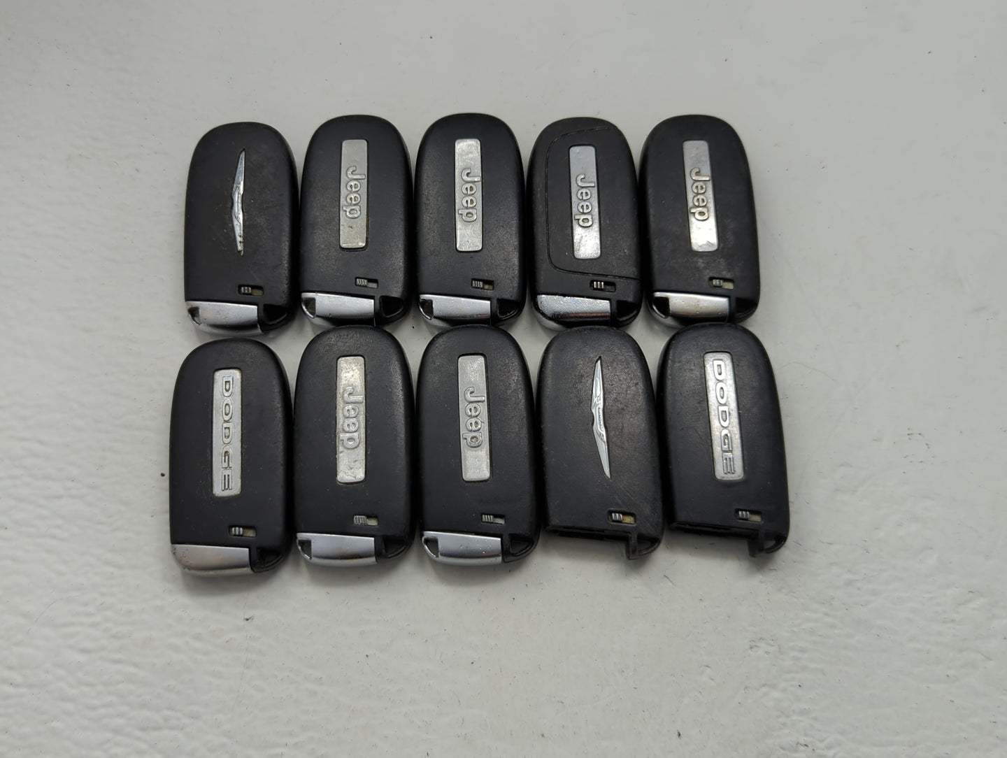 Lot of 10 Dodge Keyless Entry Remote Fob MIXED FCC IDS MIXED PART - Oemusedautoparts1.com