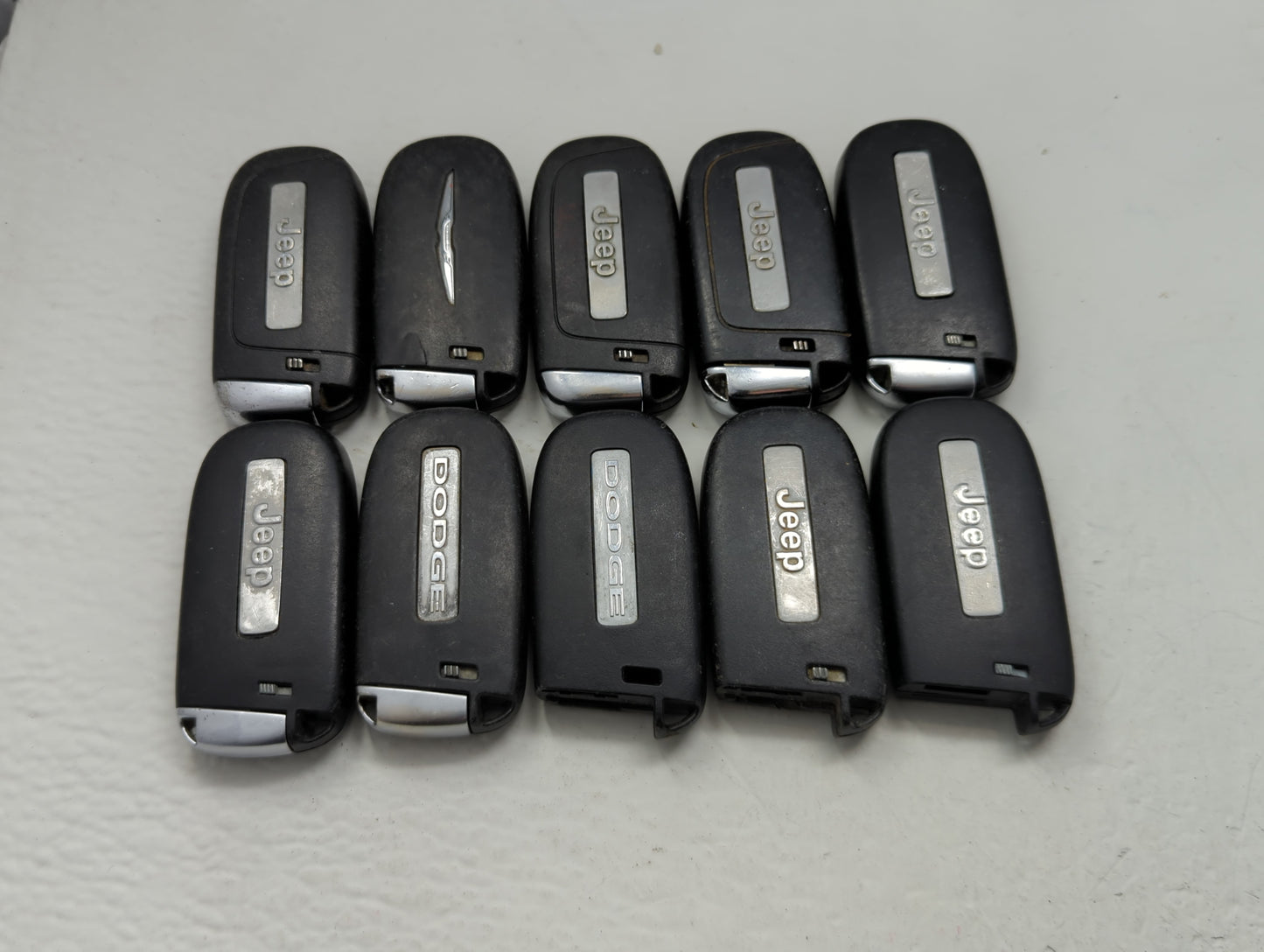 Lot of 10 Dodge Keyless Entry Remote Fob MIXED FCC IDS MIXED PART - Oemusedautoparts1.com