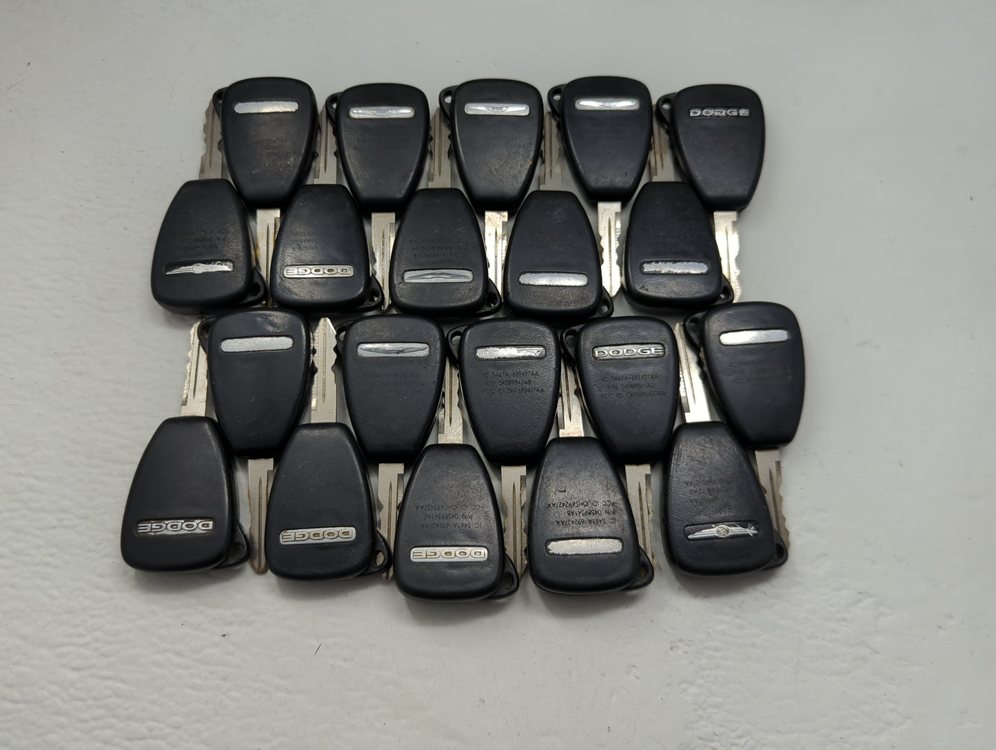 Lot of 20 Dodge Keyless Entry Remote Fob OHT692427AA MIXED PART NUMBERS - Oemusedautoparts1.com