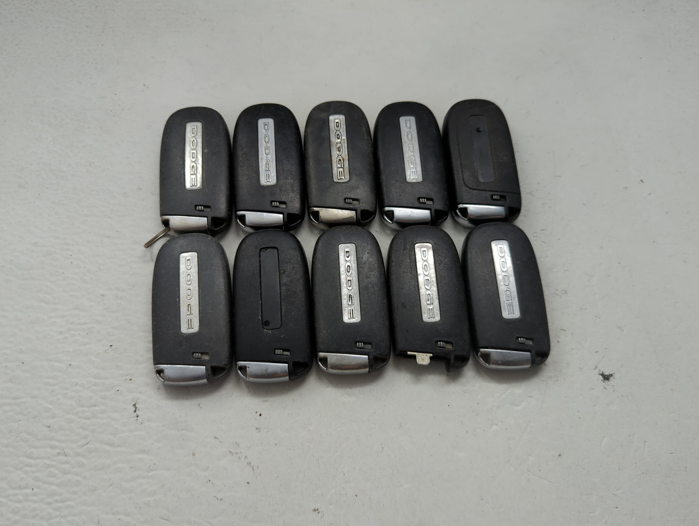 Lot of 10 Dodge Keyless Entry Remote Fob MIXED FCC IDS MIXED PART 1475803 - Oemusedautoparts1.com