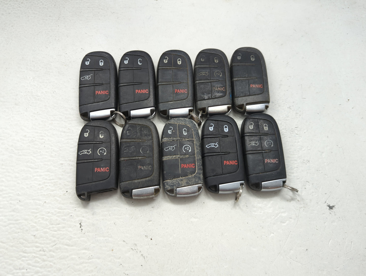 Lot of 10 Dodge Keyless Entry Remote Fob MIXED FCC IDS MIXED PART 1475804 - Oemusedautoparts1.com